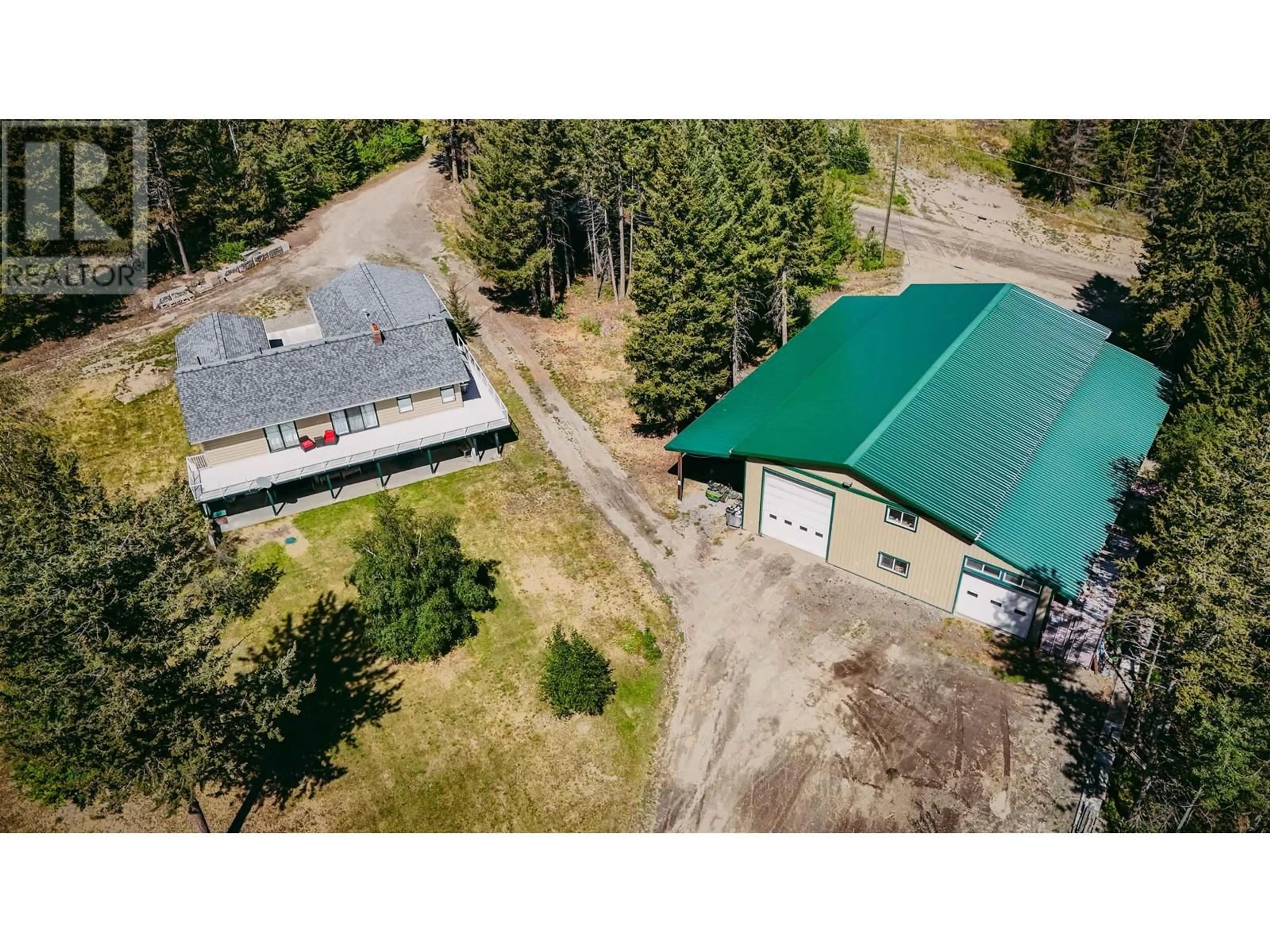 A pic from outside/outdoor area/front of a property/back of a property/a pic from drone, building for 5902 EASTWOOD ROAD, 100 Mile House British Columbia V0K2E1