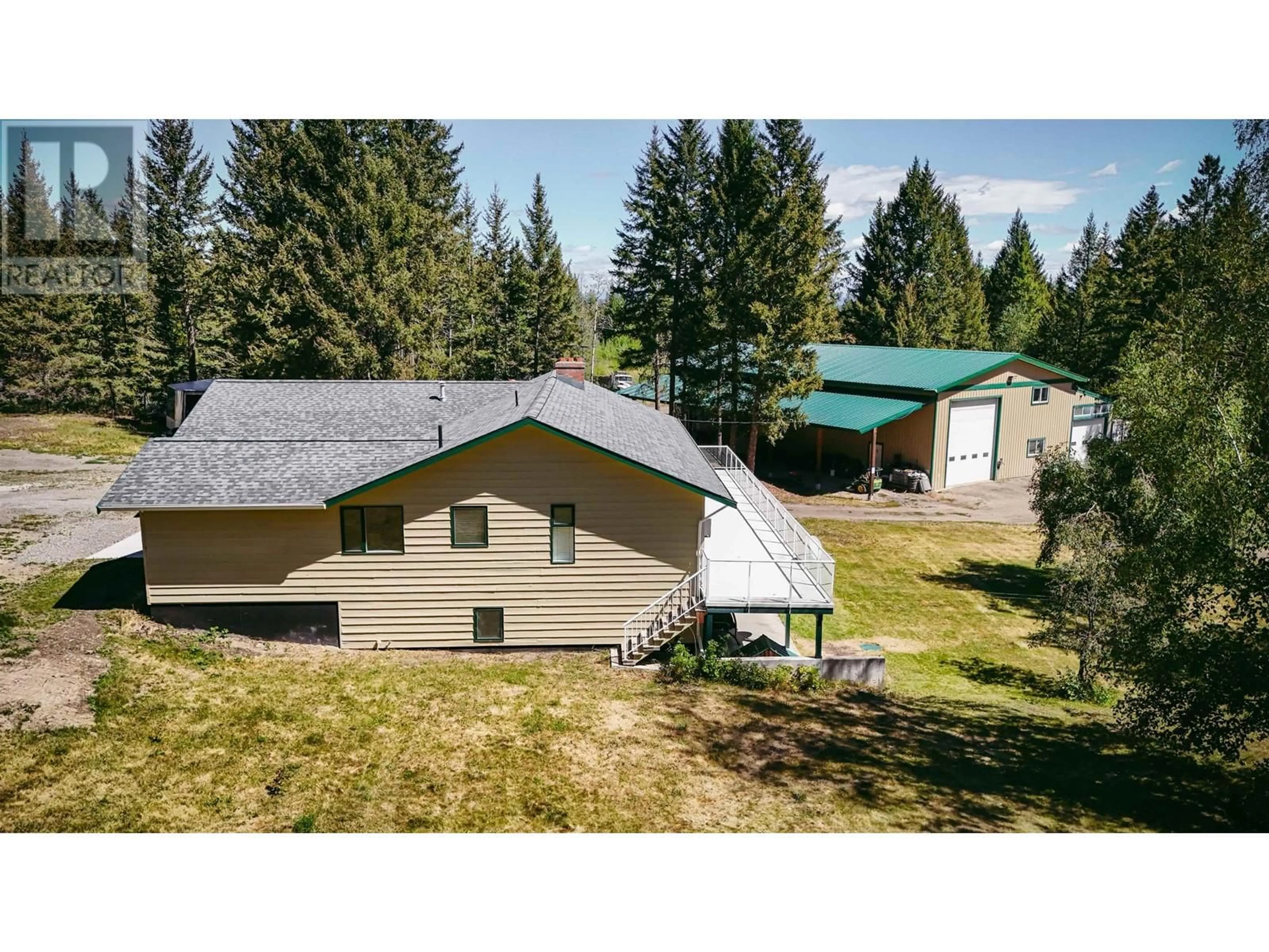 A pic from outside/outdoor area/front of a property/back of a property/a pic from drone, mountain view for 5902 EASTWOOD ROAD, 100 Mile House British Columbia V0K2E1