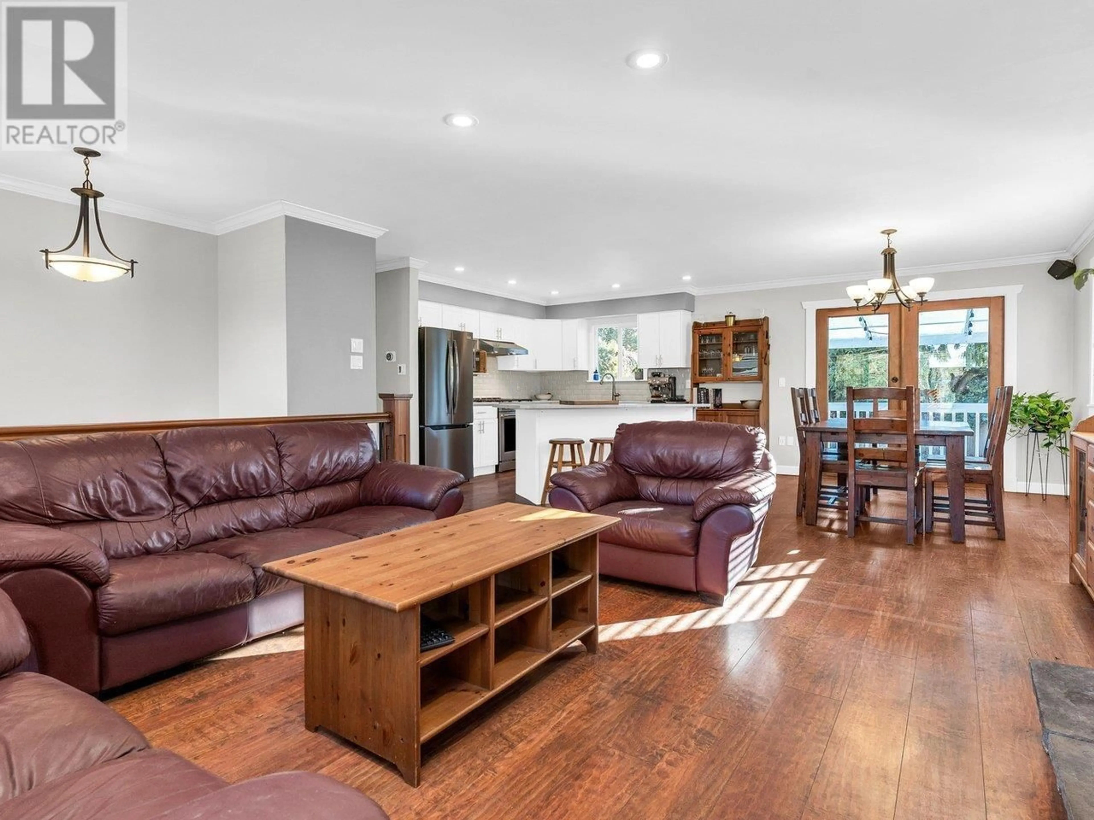 Living room with furniture, wood/laminate floor for 11610 211 STREET, Maple Ridge British Columbia V2X7T6