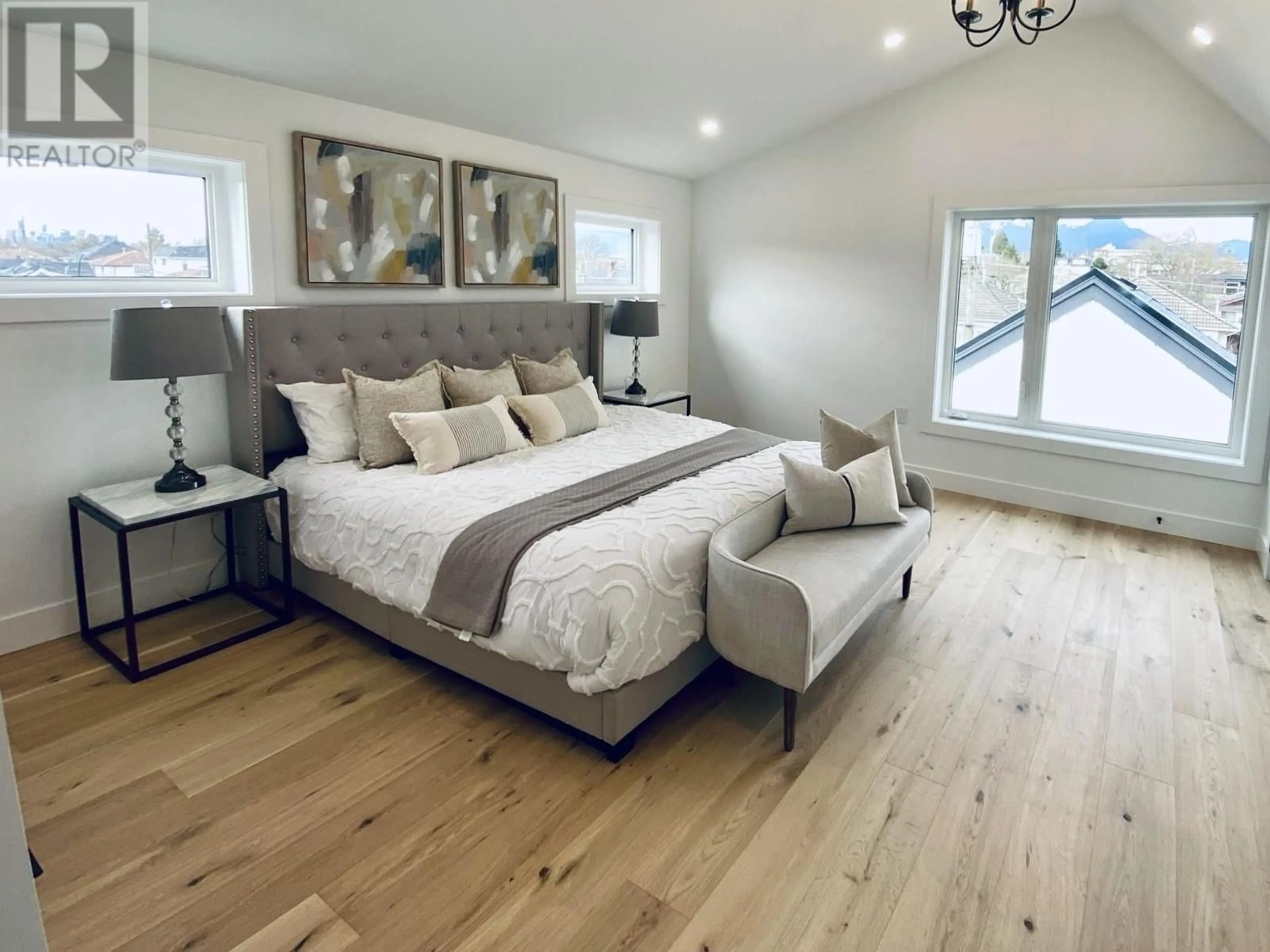 Bedroom with bed, wood/laminate floor for 1 2727 PARKER STREET, Vancouver British Columbia V5K2T6