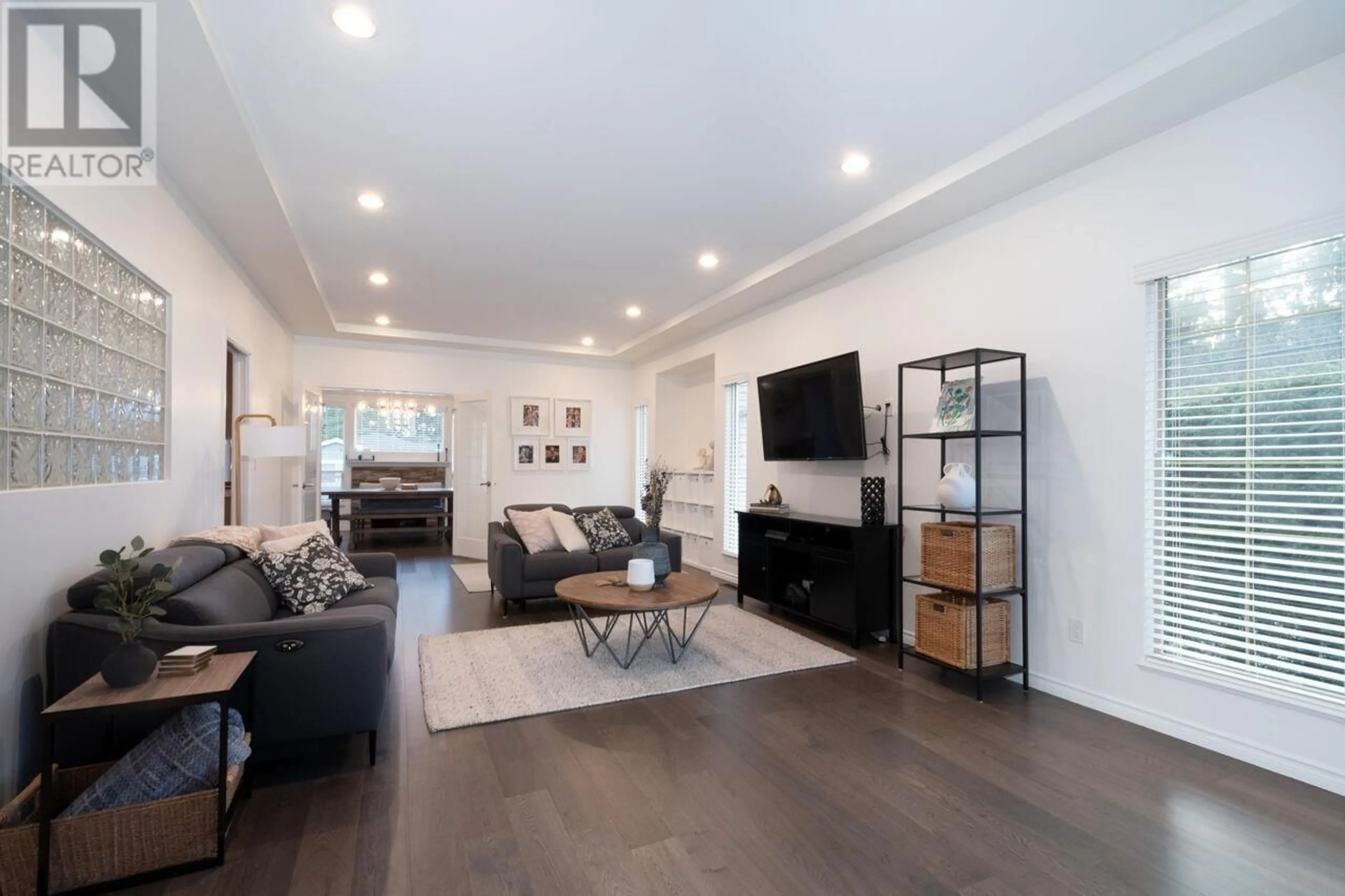 Living room with furniture, wood/laminate floor for 3282 WELLINGTON COURT, Coquitlam British Columbia V3B7X2