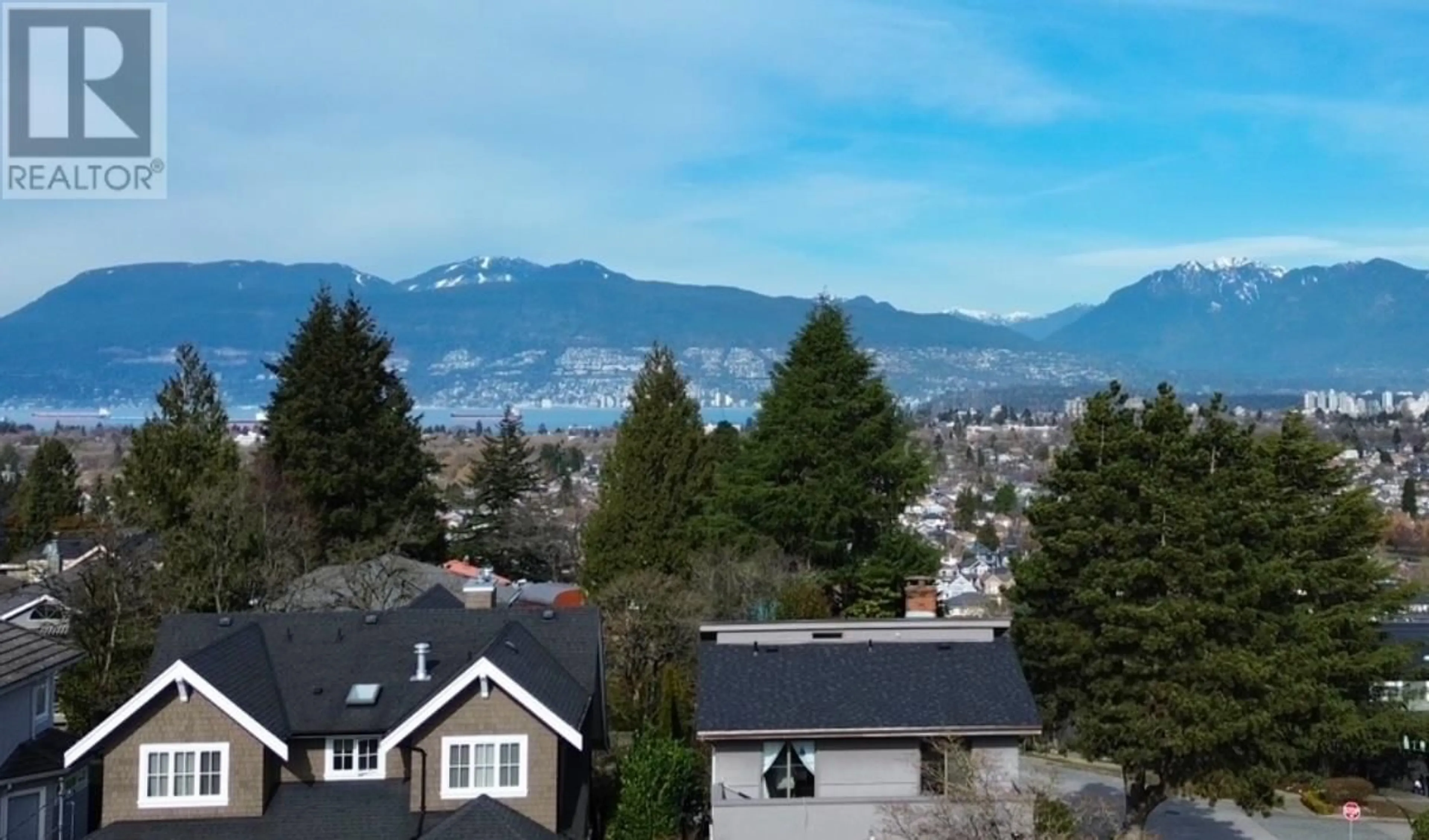 A pic from outside/outdoor area/front of a property/back of a property/a pic from drone, mountain view for 2805 W 30TH AVENUE, Vancouver British Columbia V6L1Z1