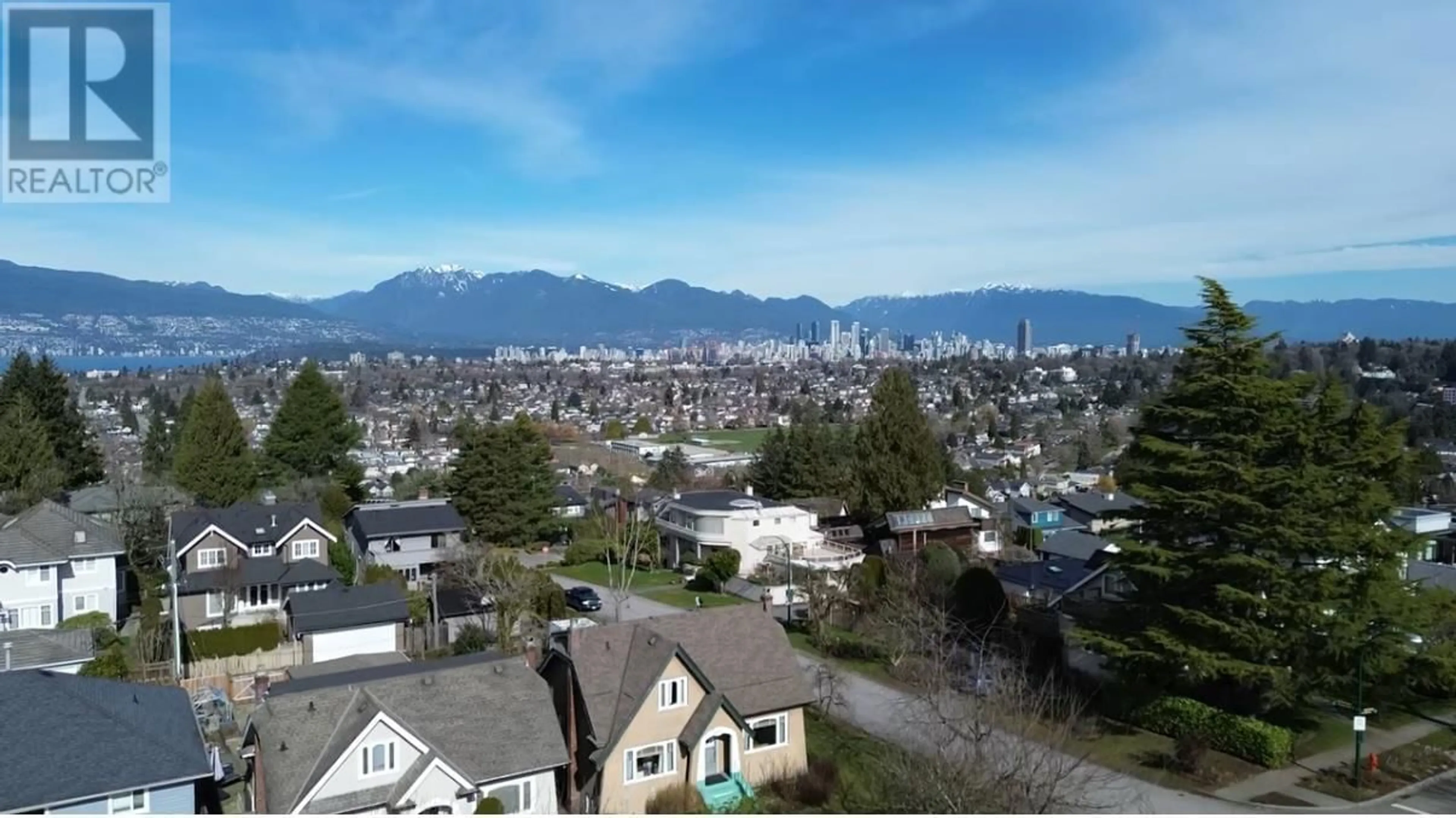 A pic from outside/outdoor area/front of a property/back of a property/a pic from drone, mountain view for 2805 W 30TH AVENUE, Vancouver British Columbia V6L1Z1