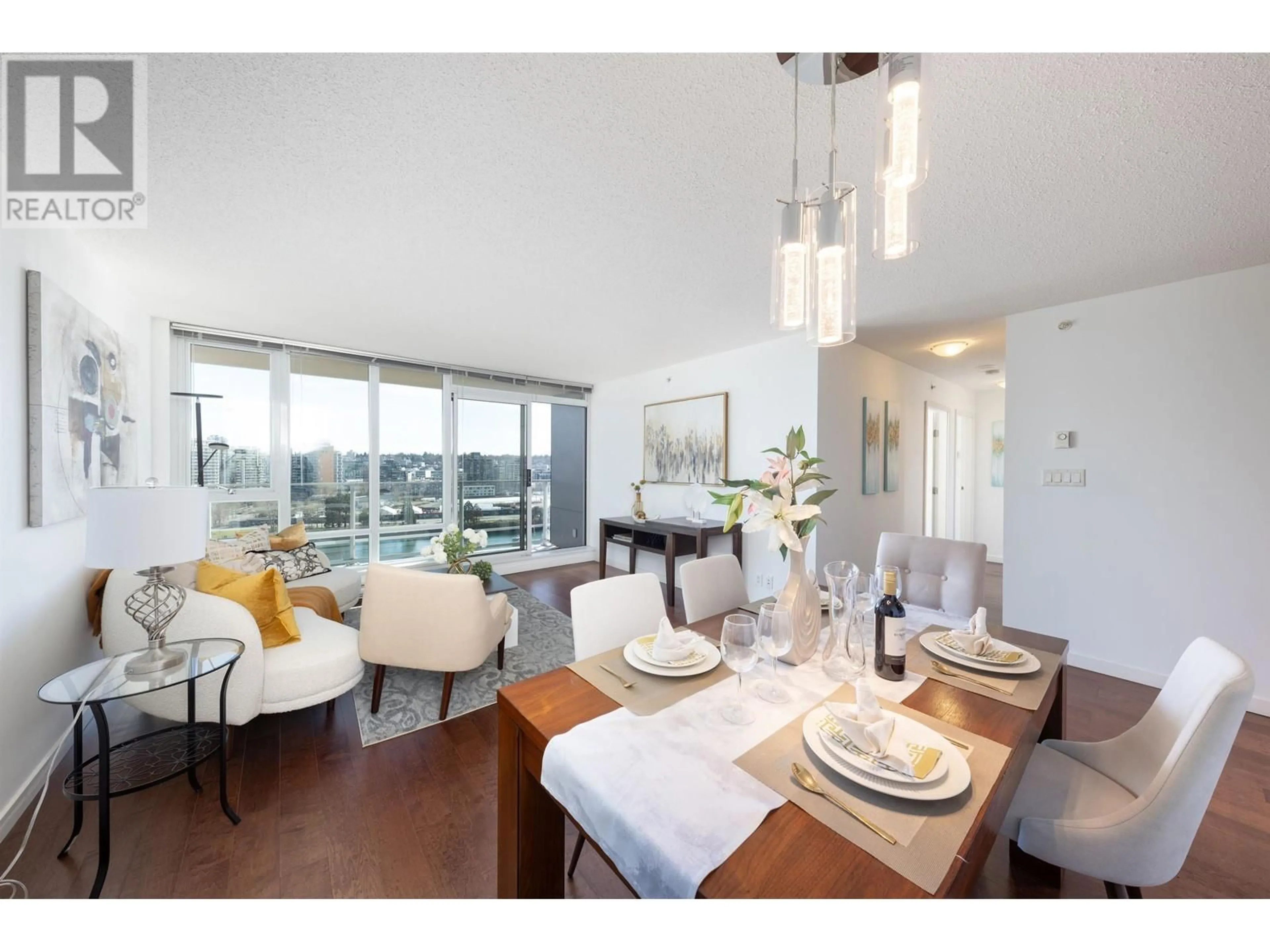 Living room with furniture, wood/laminate floor for 1507 980 COOPERAGE WAY, Vancouver British Columbia V6B0C3