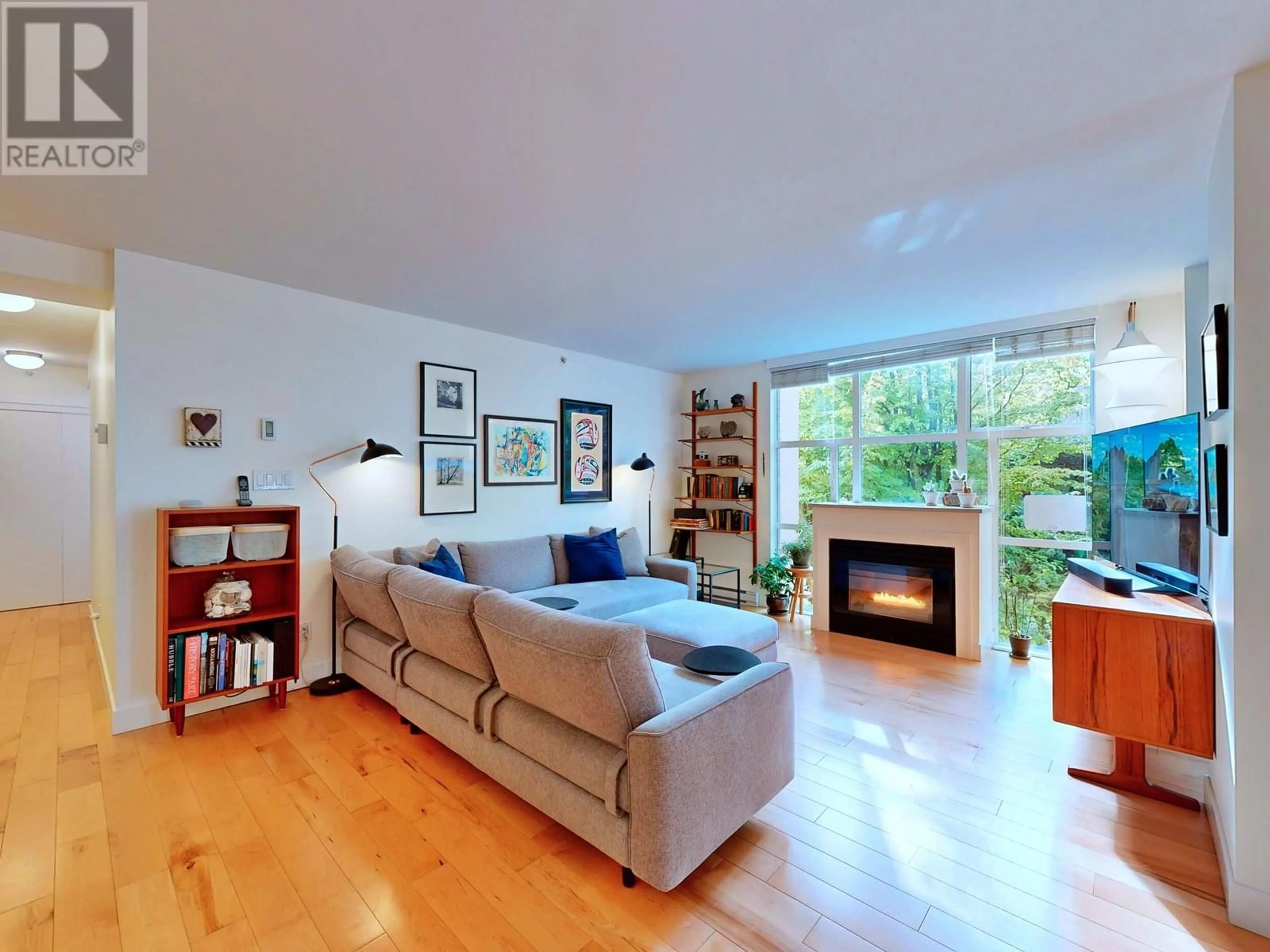 Living room with furniture, wood/laminate floor for 203 - 518 14TH AVENUE, Vancouver British Columbia V5Z4N5