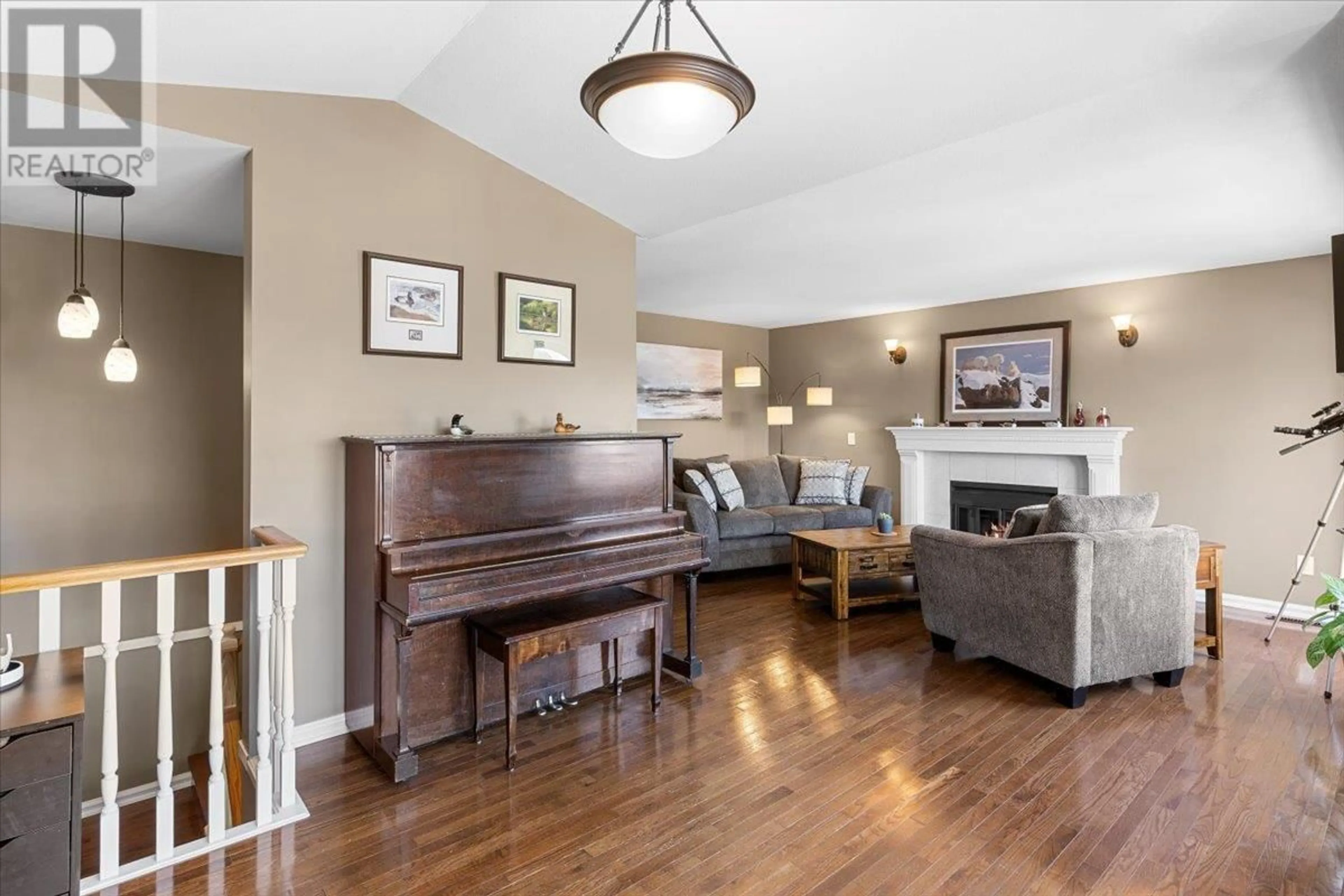 Living room with furniture, wood/laminate floor for 1294 RICARD PLACE, Port Coquitlam British Columbia V3C5H3