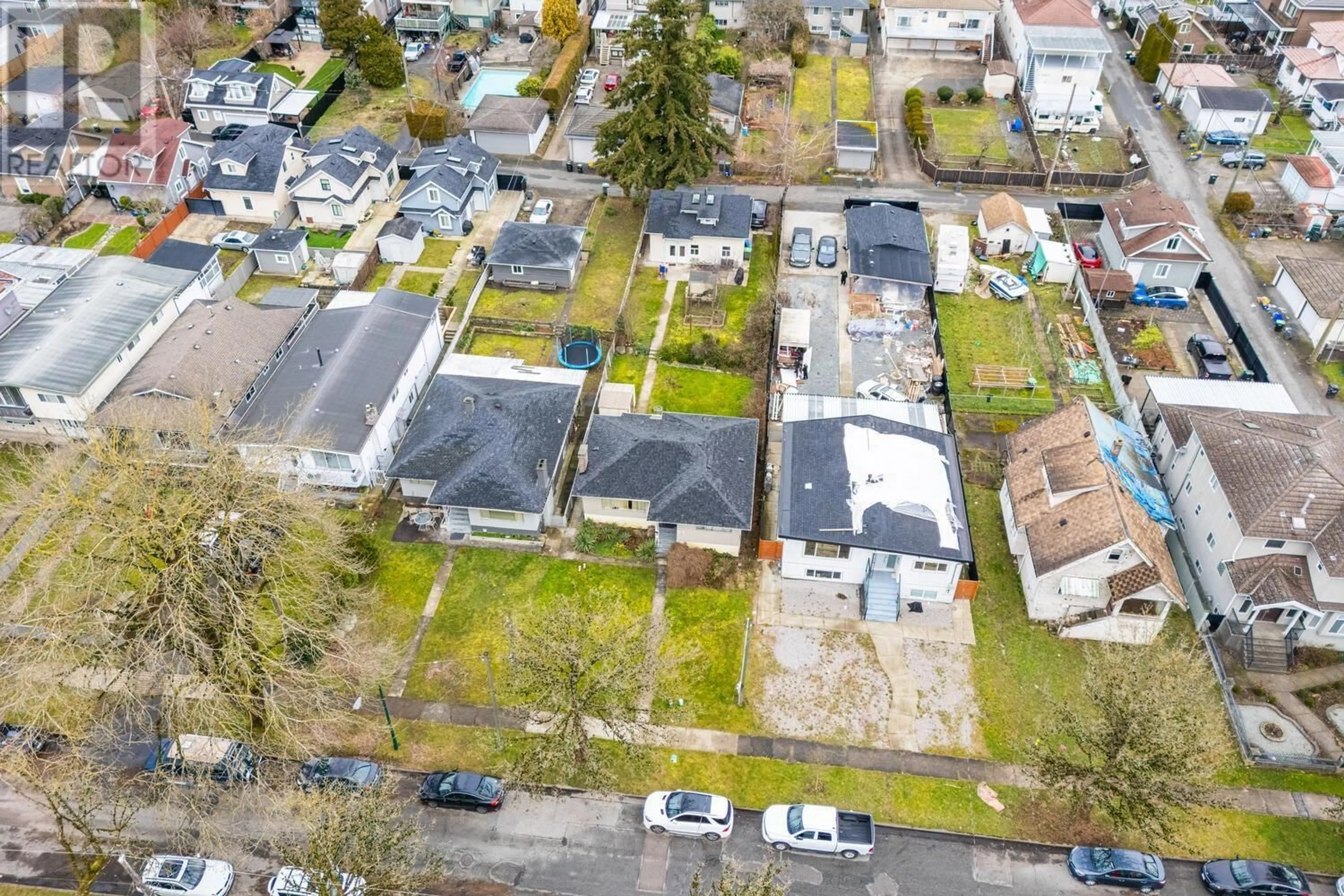 A pic from outside/outdoor area/front of a property/back of a property/a pic from drone, street for 1187 54TH AVENUE, Vancouver British Columbia V5X1M1