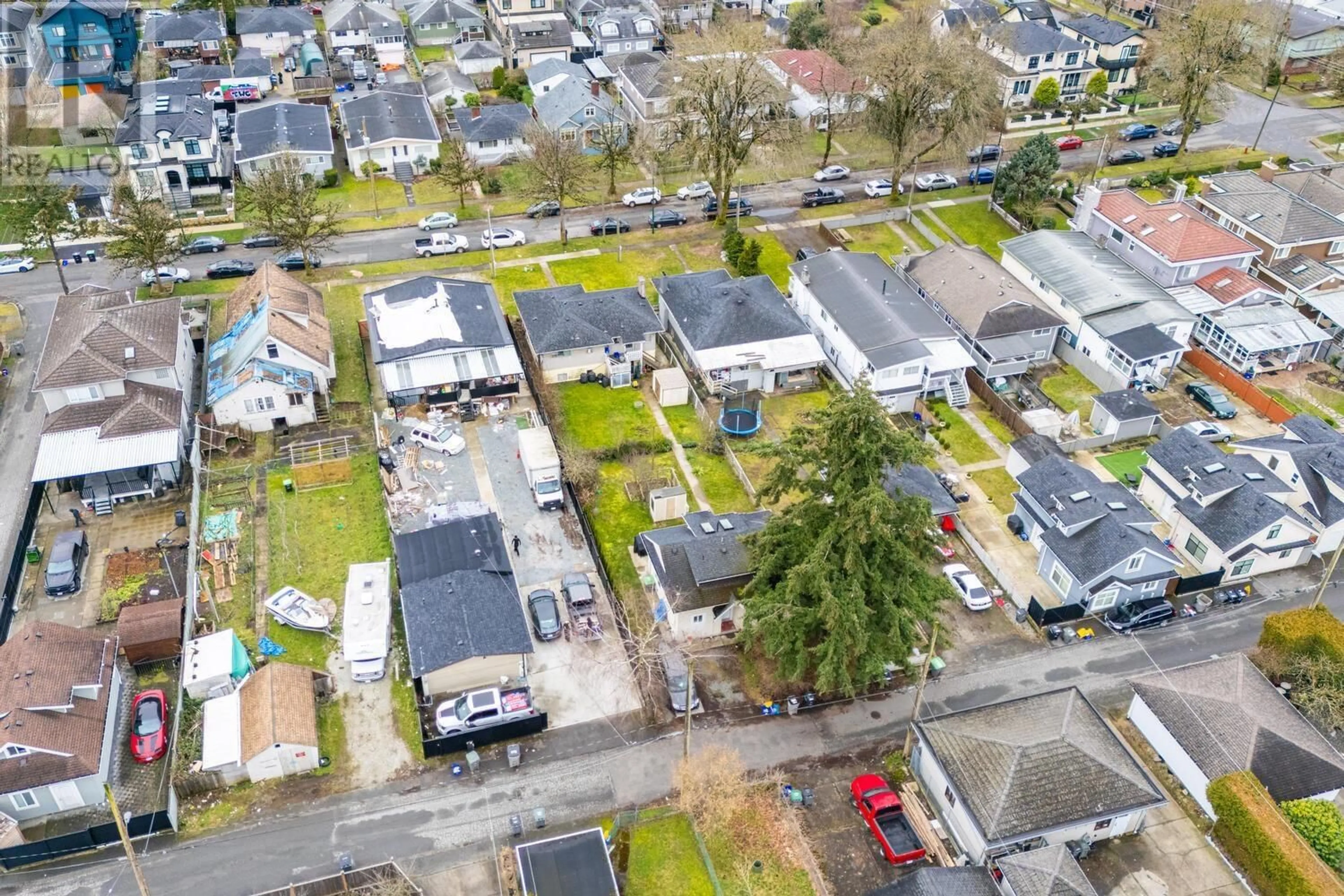 A pic from outside/outdoor area/front of a property/back of a property/a pic from drone, street for 1187 54TH AVENUE, Vancouver British Columbia V5X1M1