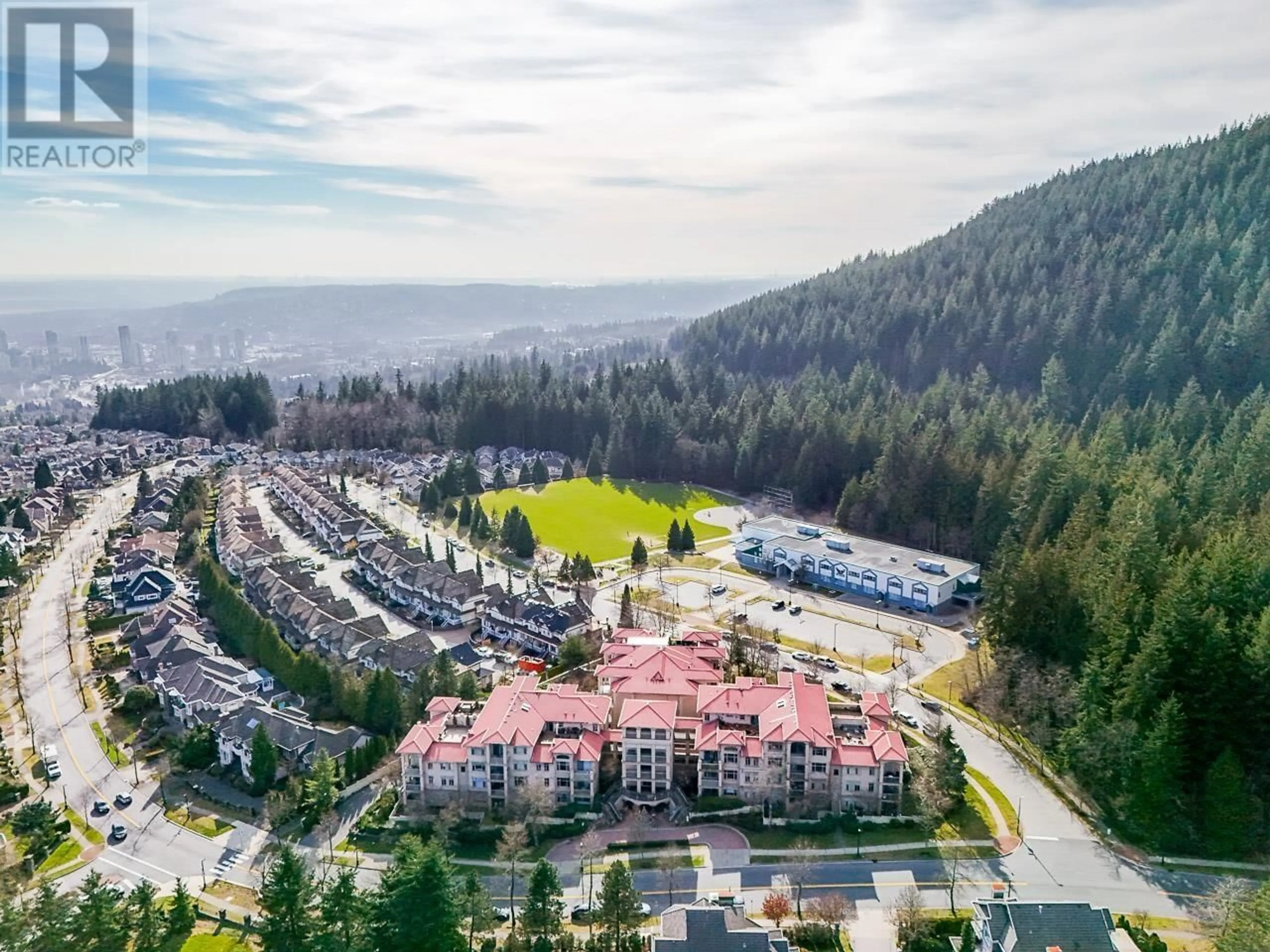 A pic from outside/outdoor area/front of a property/back of a property/a pic from drone, mountain view for 408 3176 PLATEAU BOULEVARD, Coquitlam British Columbia V3E3J2