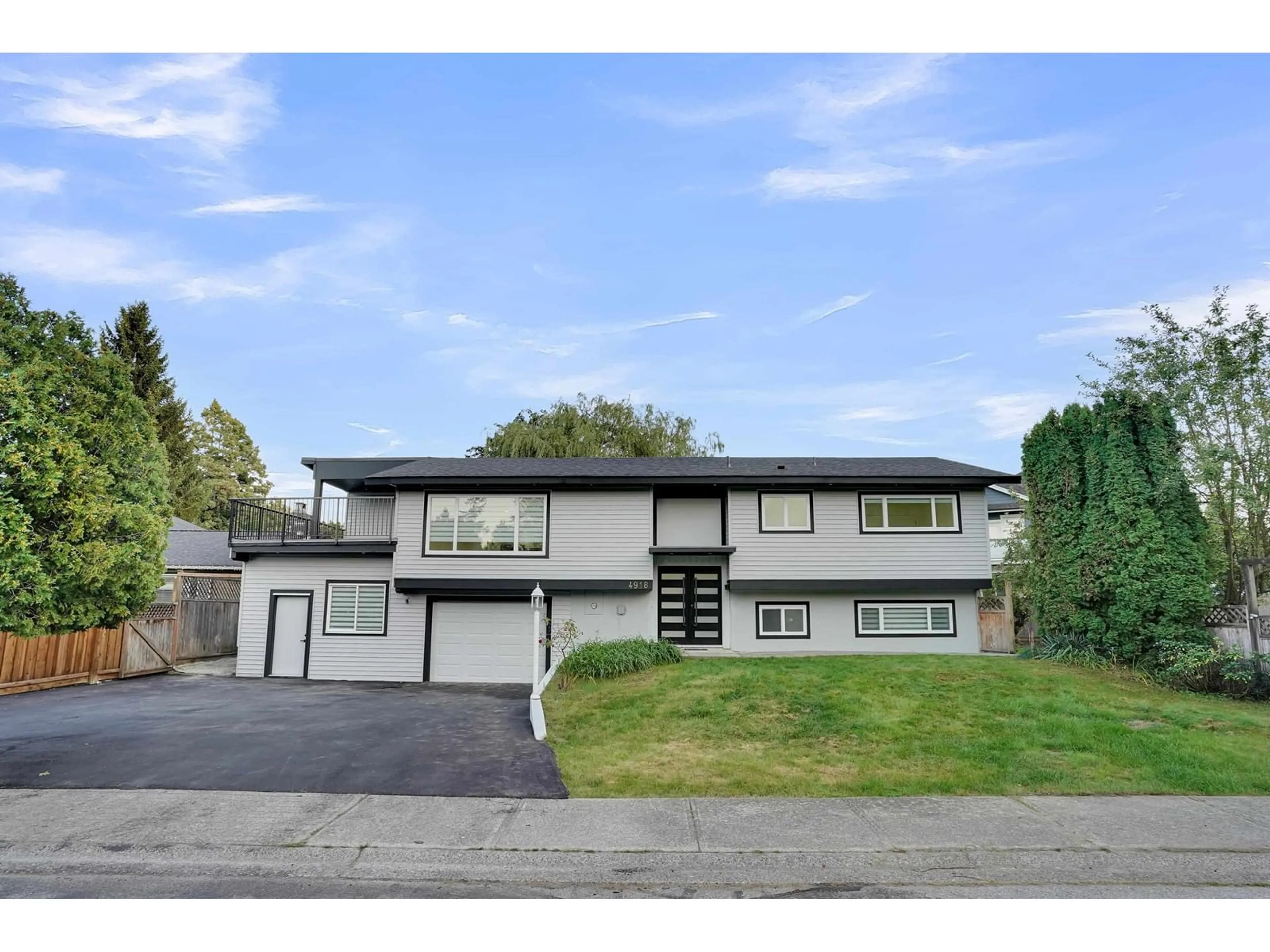 Home with vinyl exterior material, street for 4918 198B STREET, Langley British Columbia V3A6L4