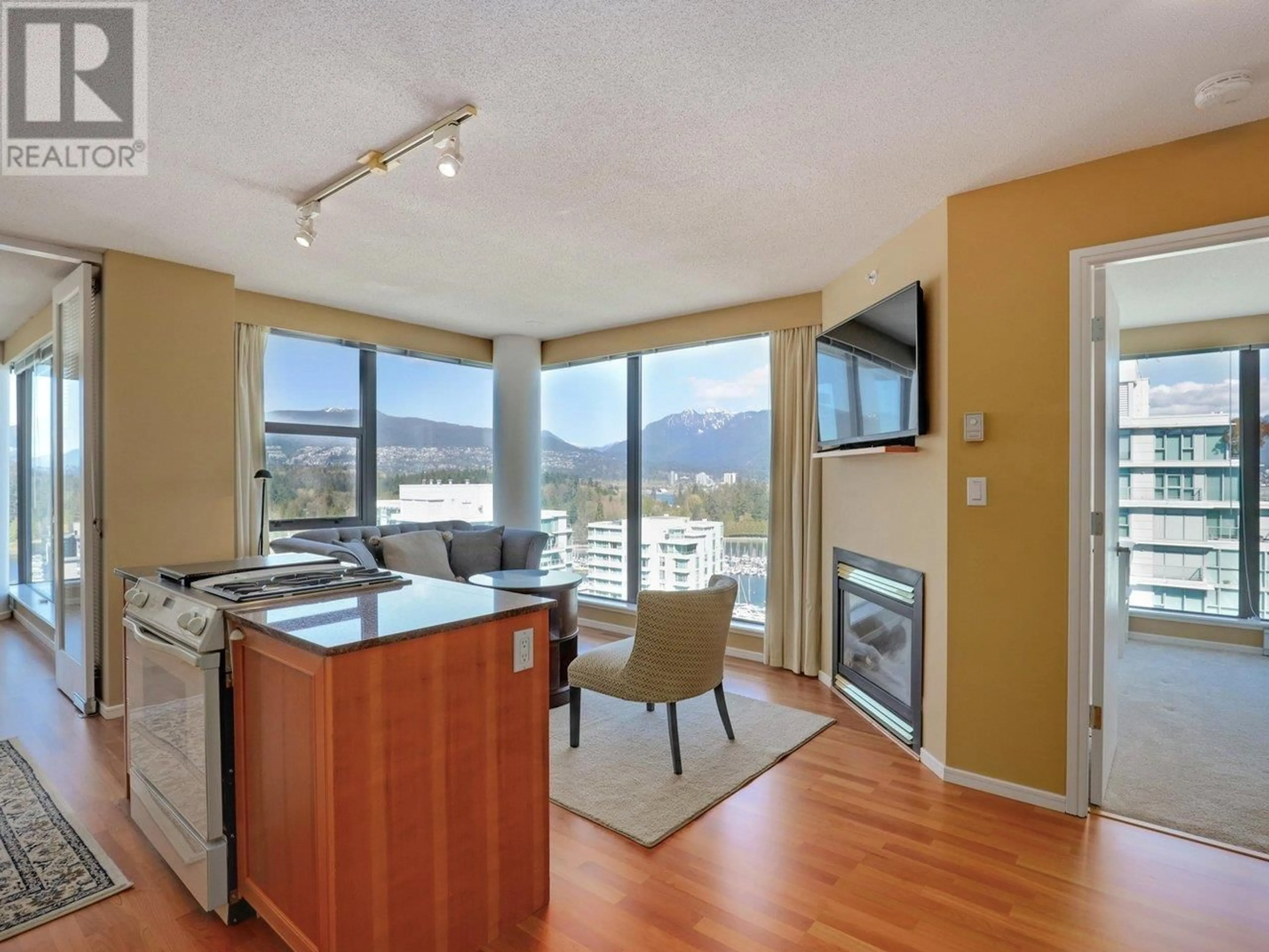Open concept kitchen, wood/laminate floor for 2406 - 1723 ALBERNI STREET, Vancouver British Columbia V6G3G9