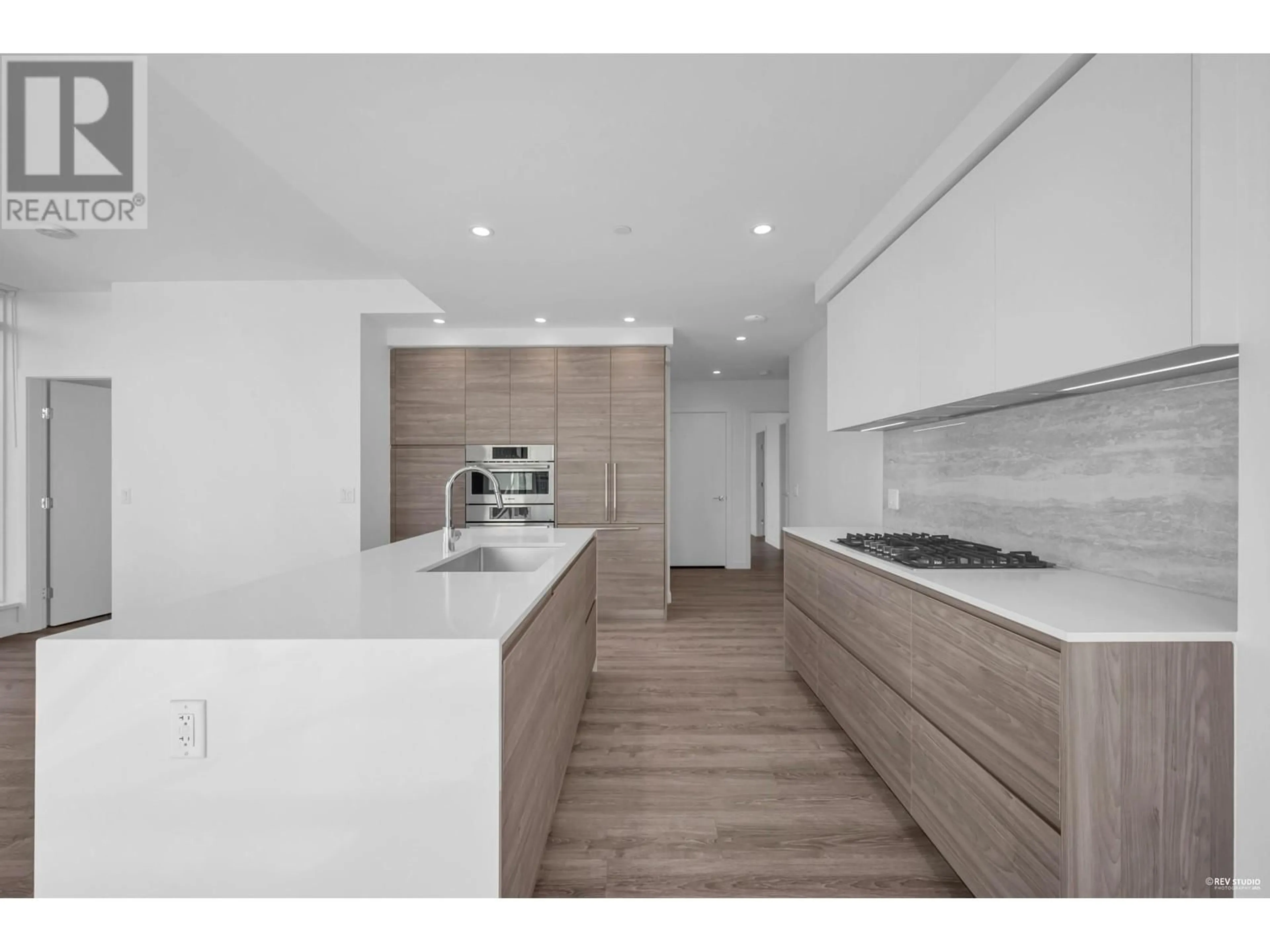 Open concept kitchen, wood/laminate floor for 604 - 660 QUAYSIDE DRIVE, New Westminster British Columbia V3M0P2
