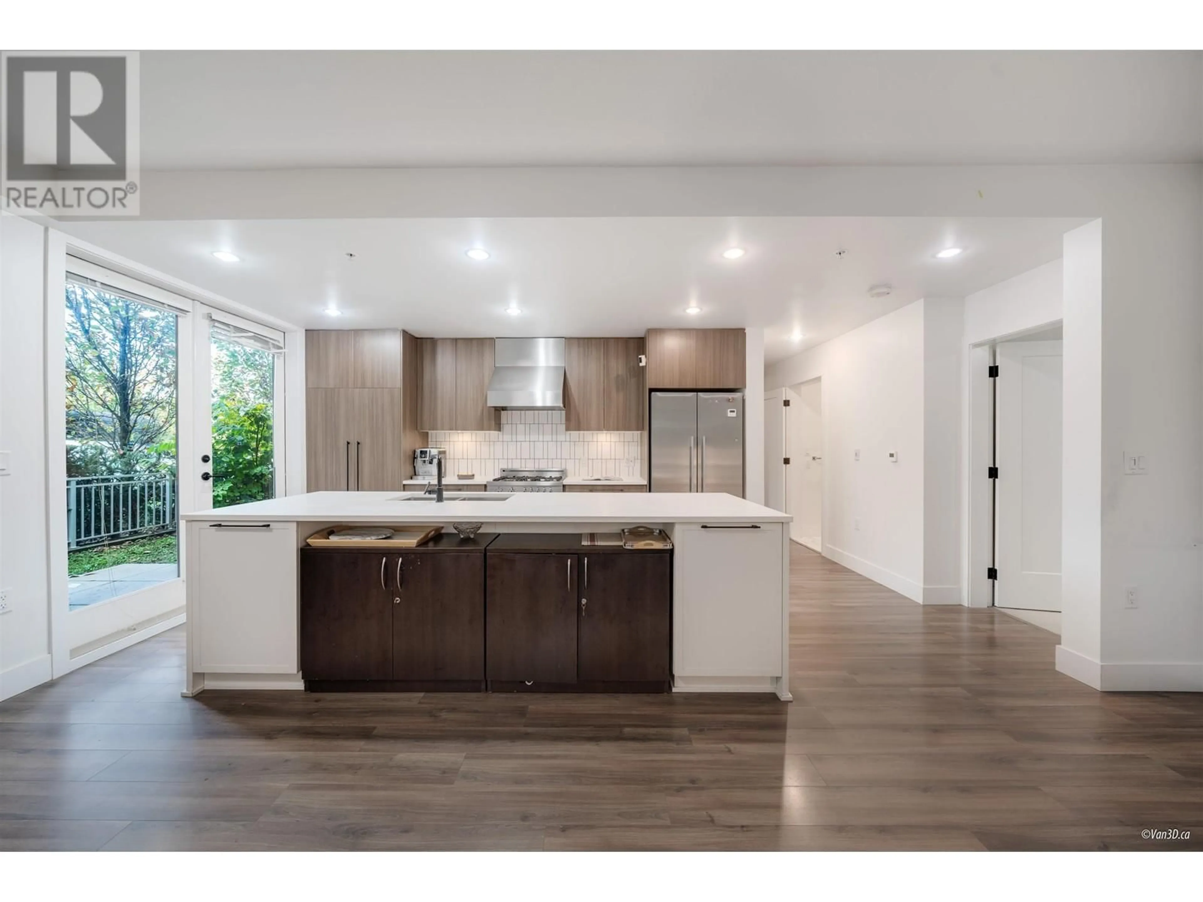 Open concept kitchen, unknown for 106 - 6933 CAMBIE STREET, Vancouver British Columbia V6P0J1