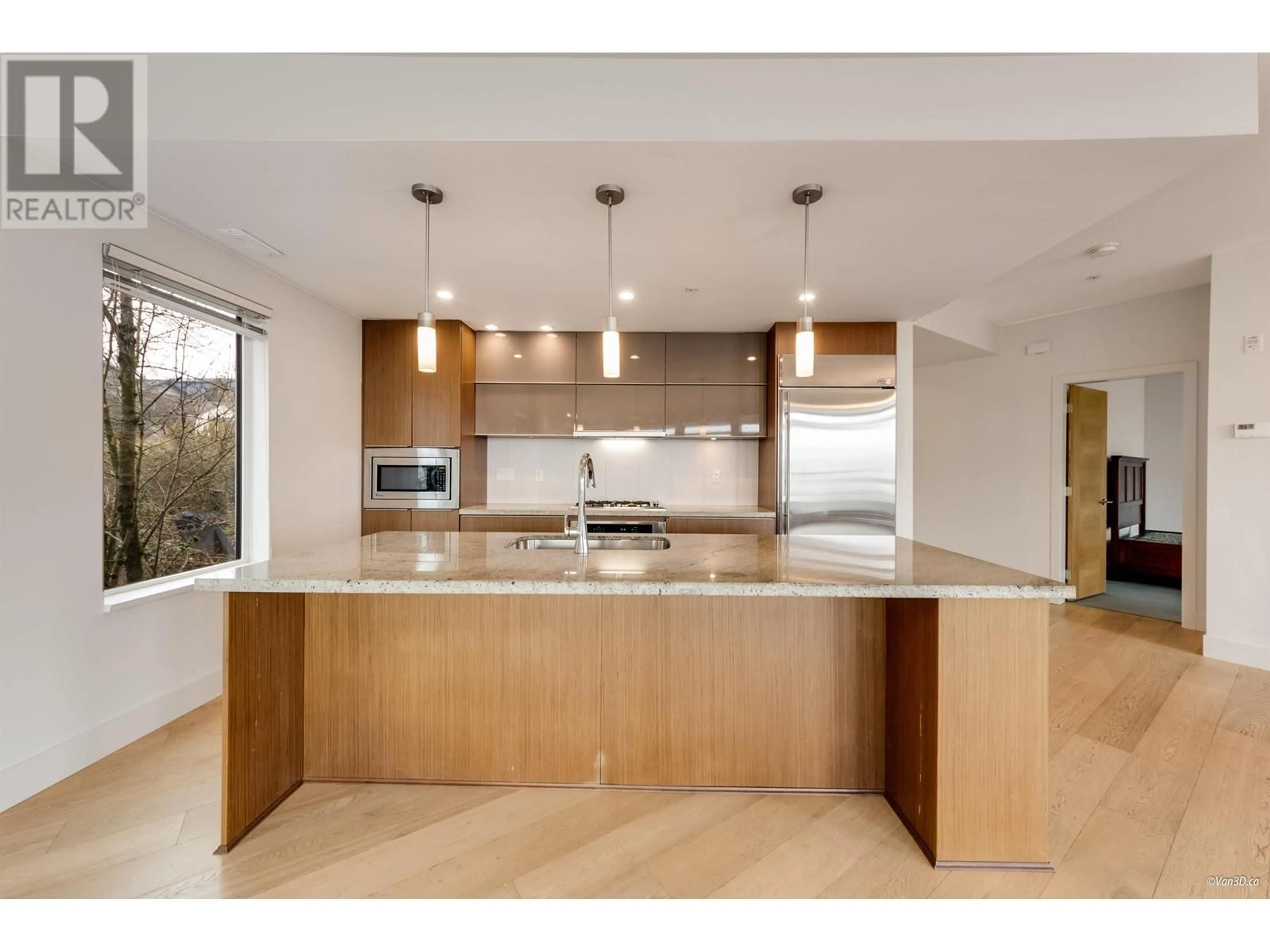 Open concept kitchen, wood/laminate floor for 2995 WALL STREET, Vancouver British Columbia V5K0A6