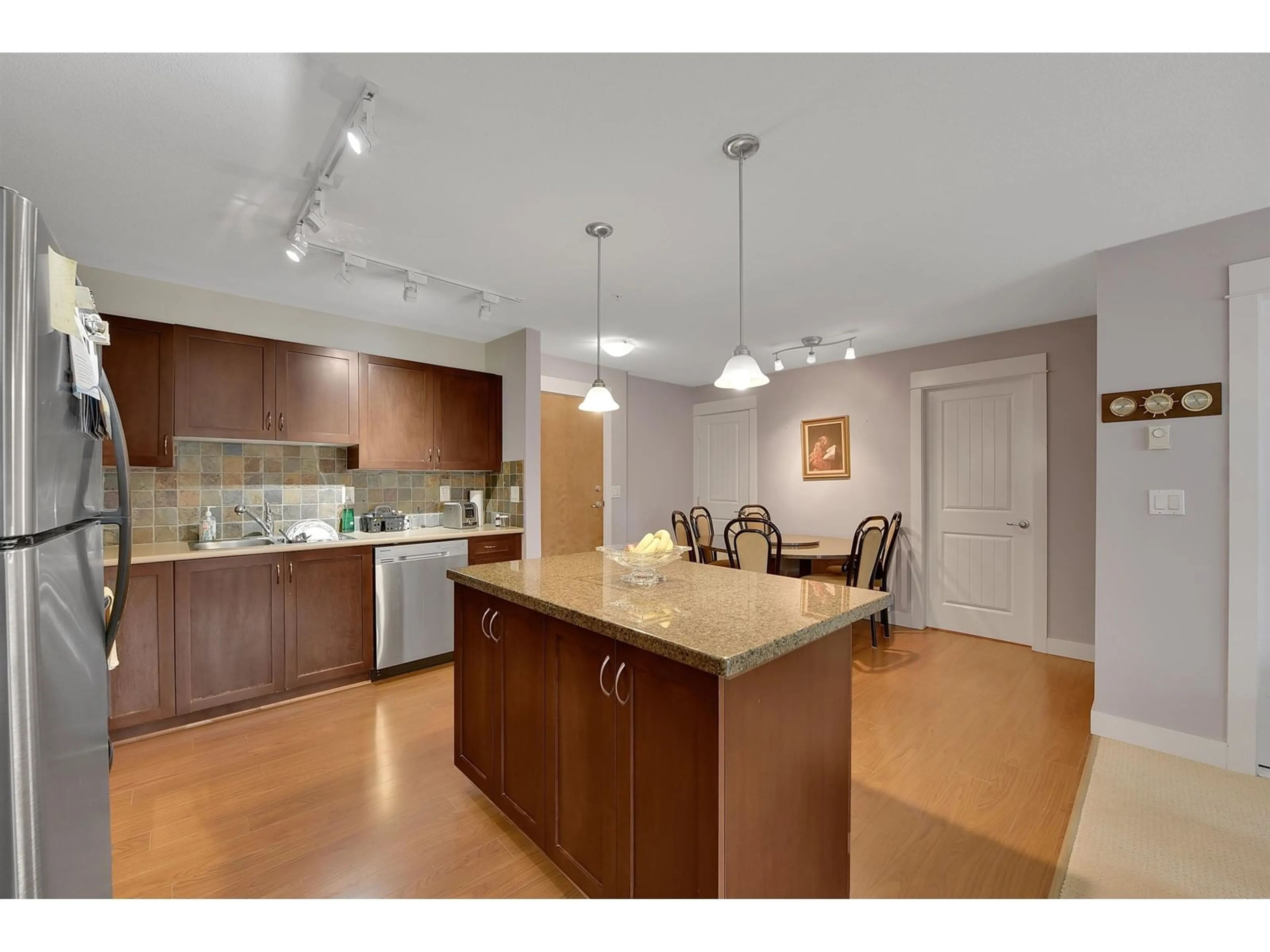 Open concept kitchen, unknown for 310 2955 DIAMOND CRESCENT, Abbotsford British Columbia V2T2L5