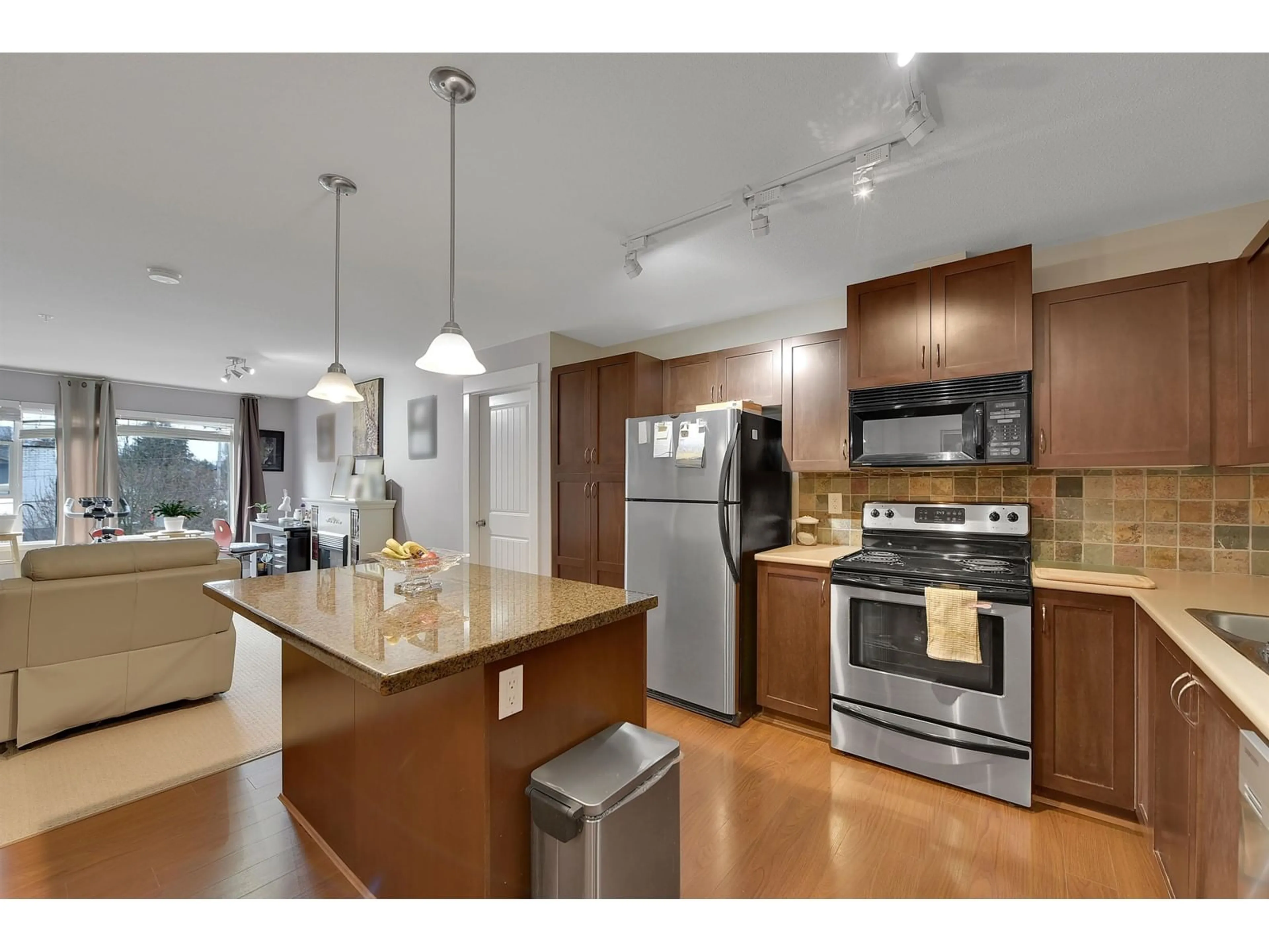 Open concept kitchen, unknown for 310 2955 DIAMOND CRESCENT, Abbotsford British Columbia V2T2L5