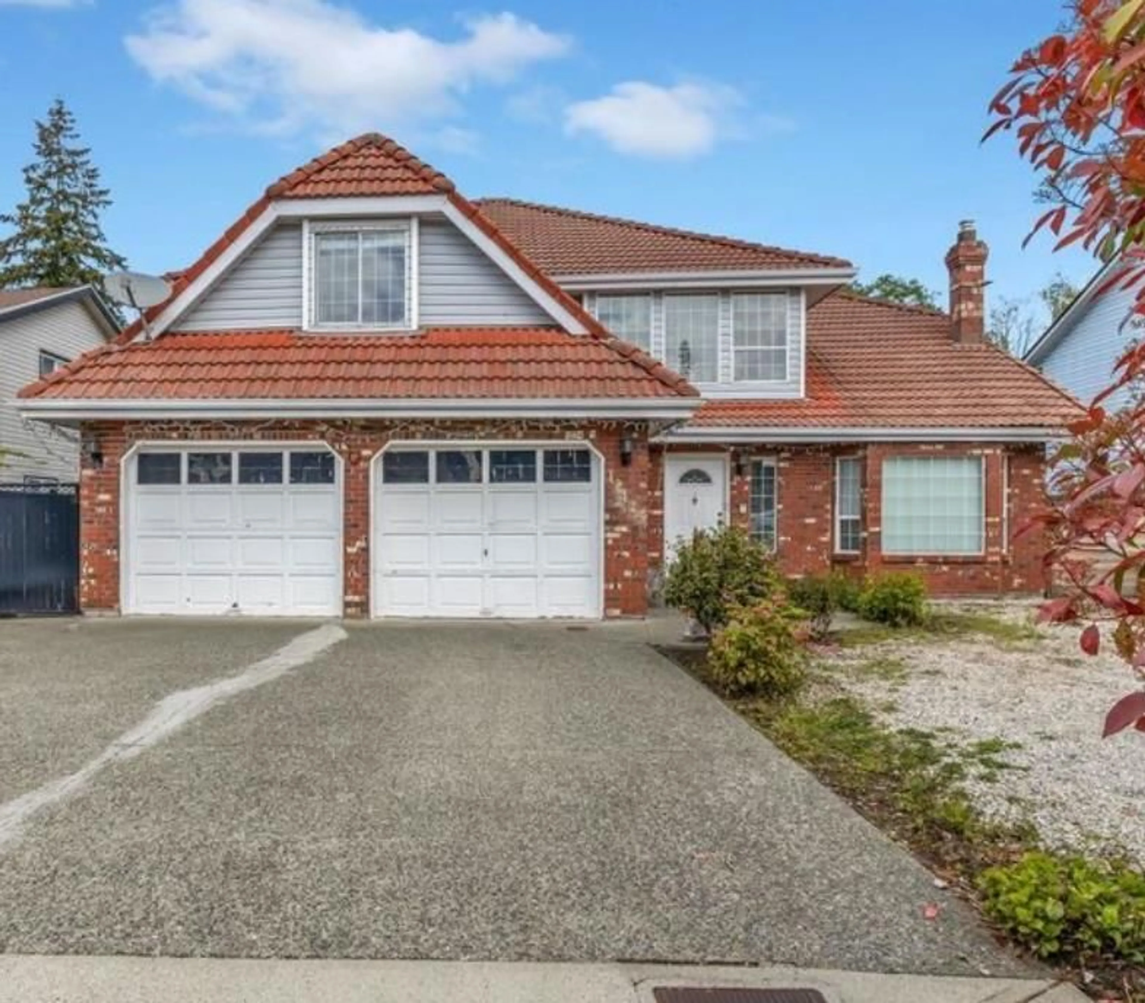 Home with brick exterior material, street for 12425 69A AVENUE, Surrey British Columbia V3W0L8