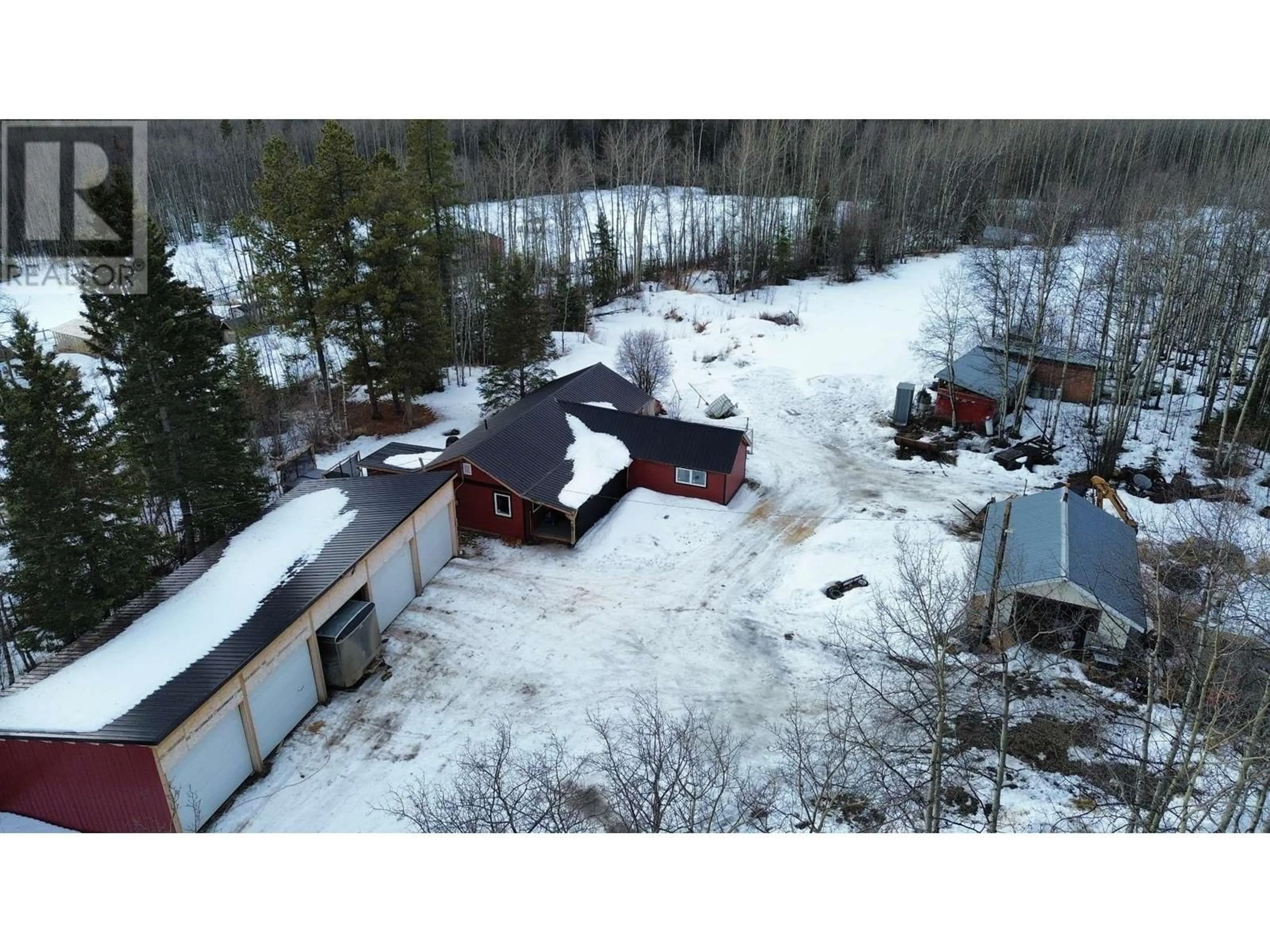 A pic from outside/outdoor area/front of a property/back of a property/a pic from drone, building for 15290 MUSEUM WAY, Fort St. John British Columbia V0C2R0