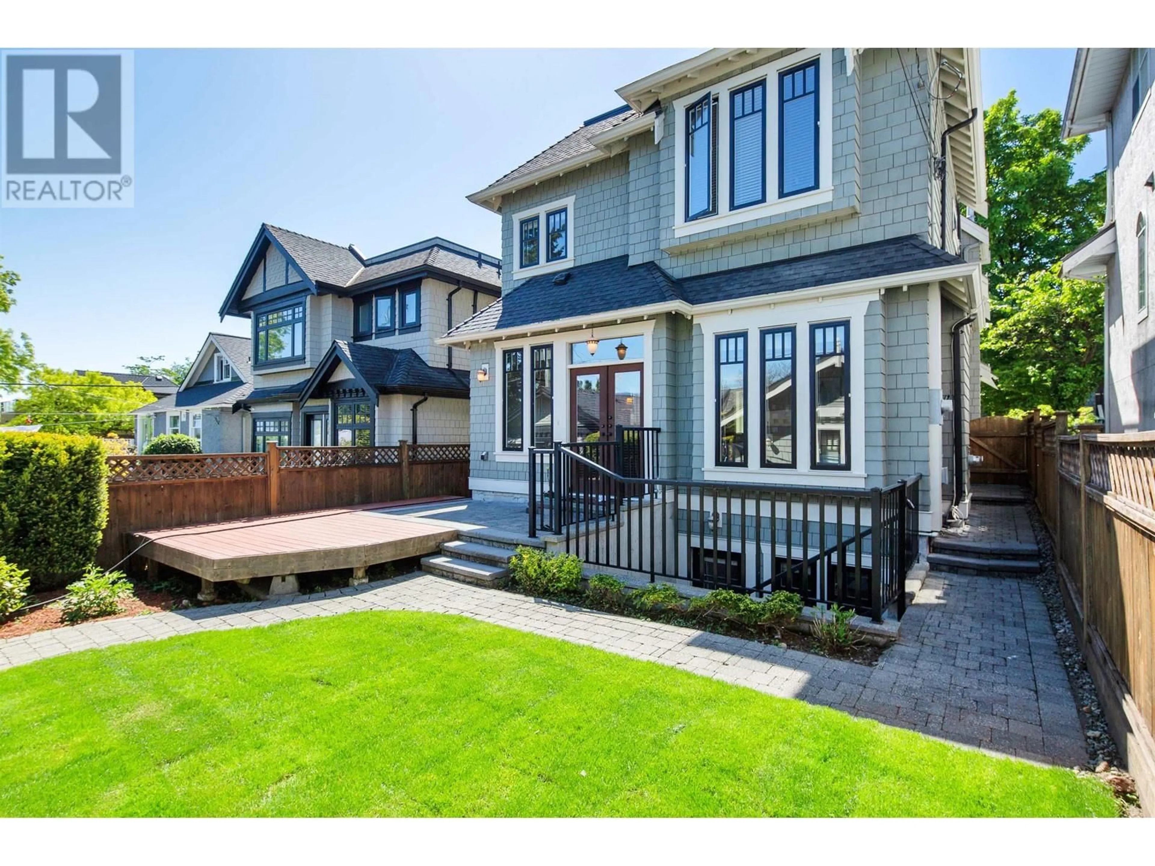 Home with vinyl exterior material, street for 4509 W 8TH AVENUE, Vancouver British Columbia V6R2A4