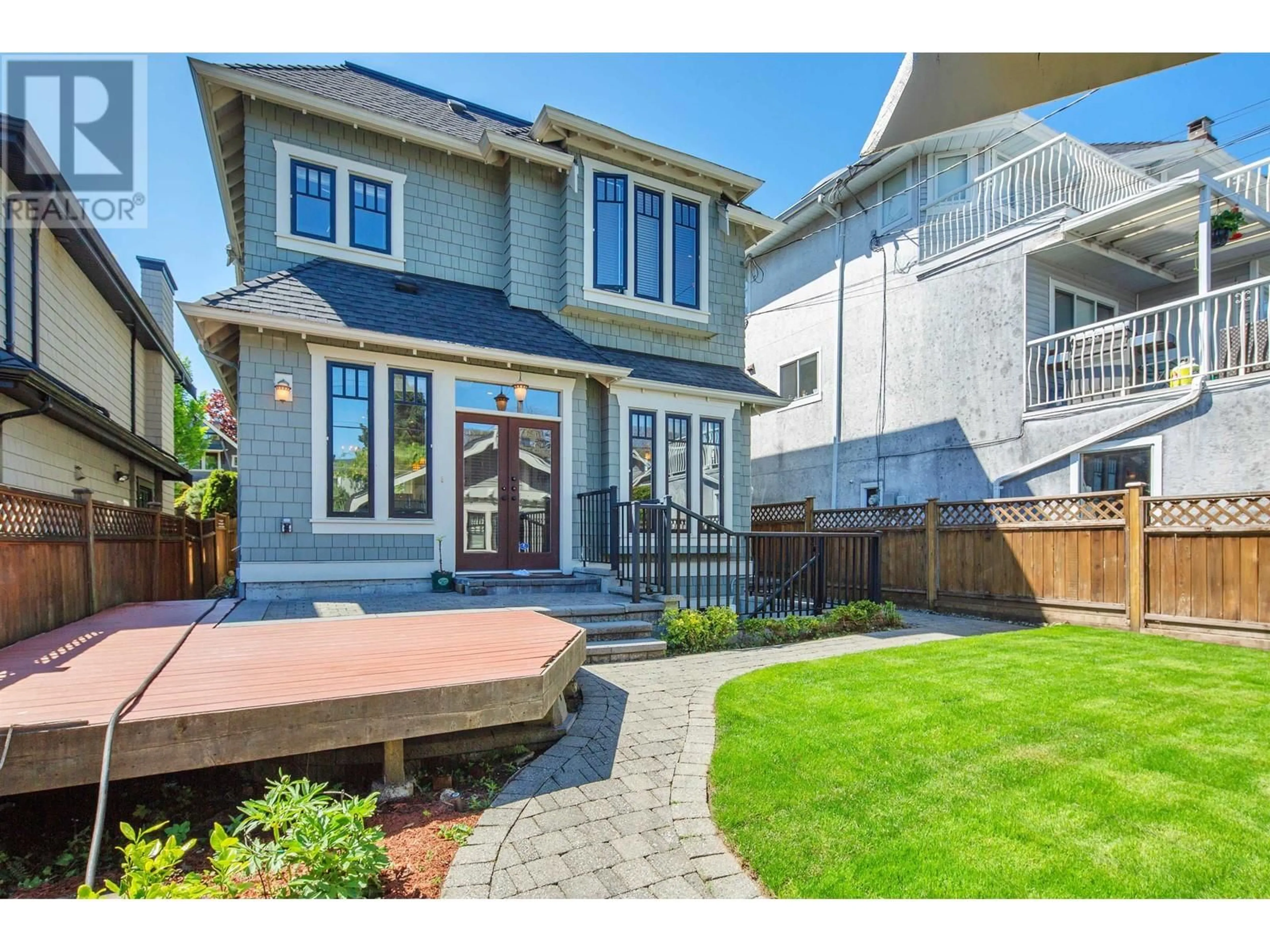 Home with vinyl exterior material, street for 4509 W 8TH AVENUE, Vancouver British Columbia V6R2A4