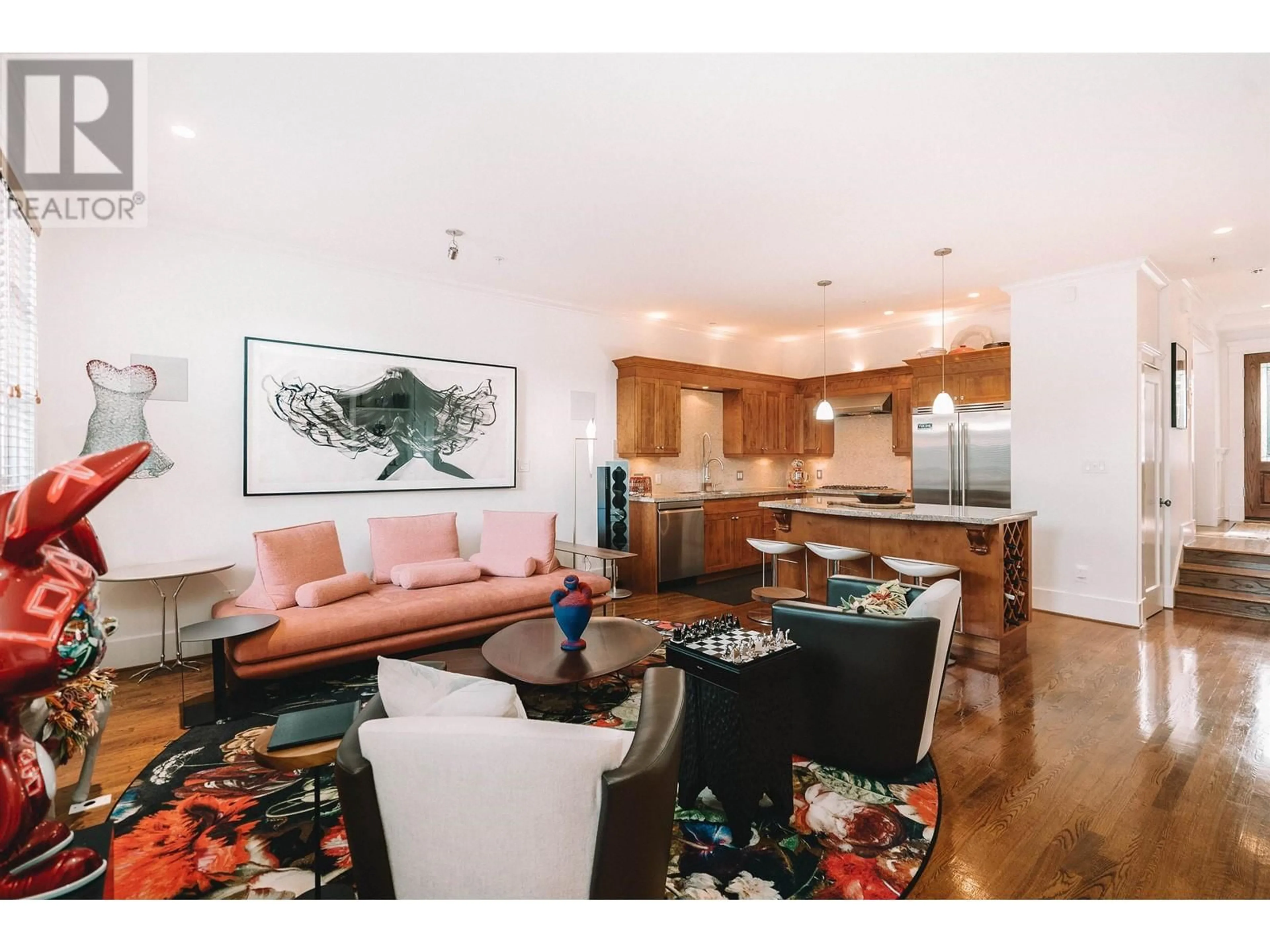 Living room with furniture, wood/laminate floor for 2511 W 1ST AVENUE, Vancouver British Columbia V6K1G8