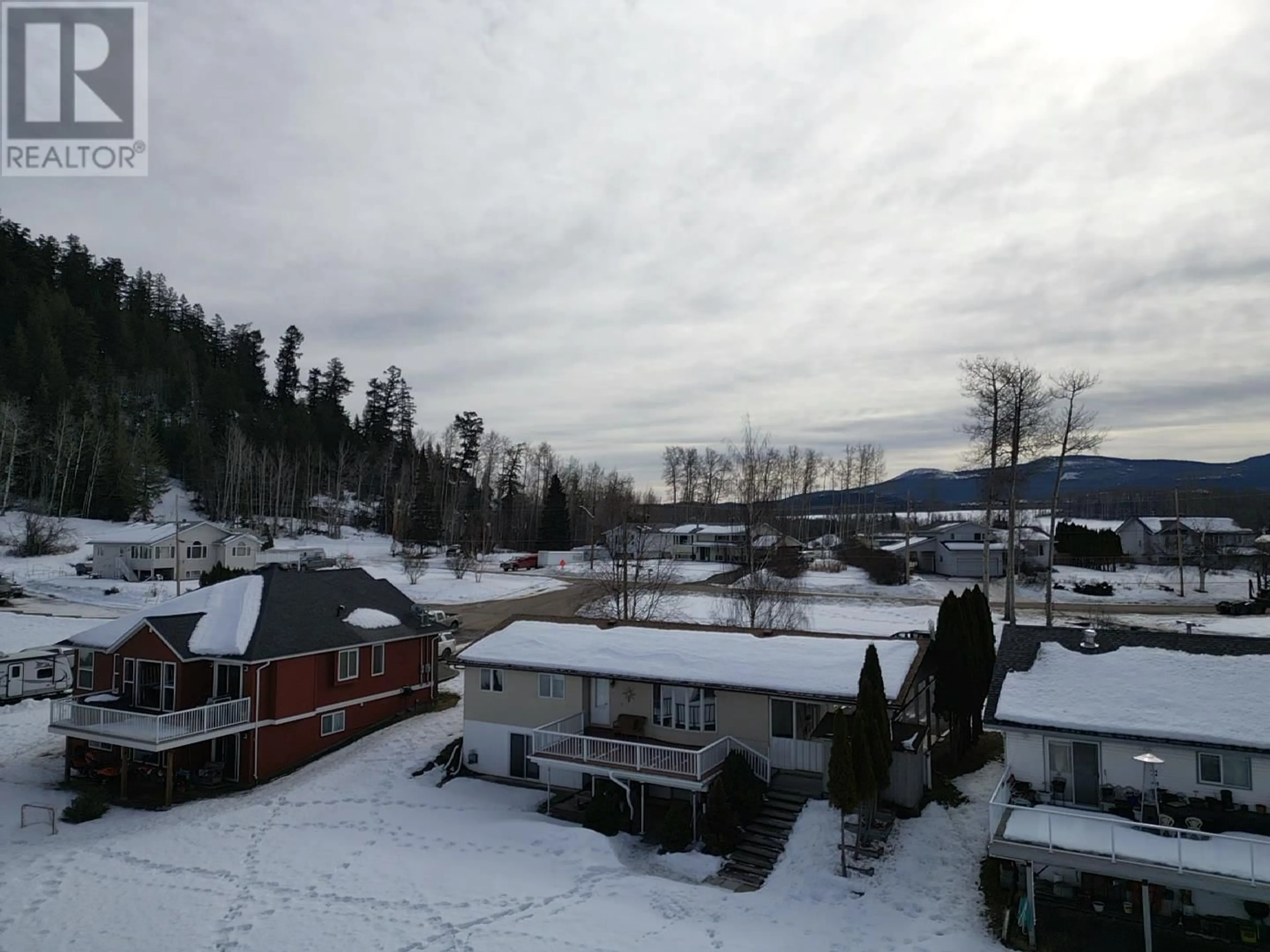 A pic from outside/outdoor area/front of a property/back of a property/a pic from drone, mountain view for 551 SIMON FRASER AVENUE, Fraser Lake British Columbia V0J1S0