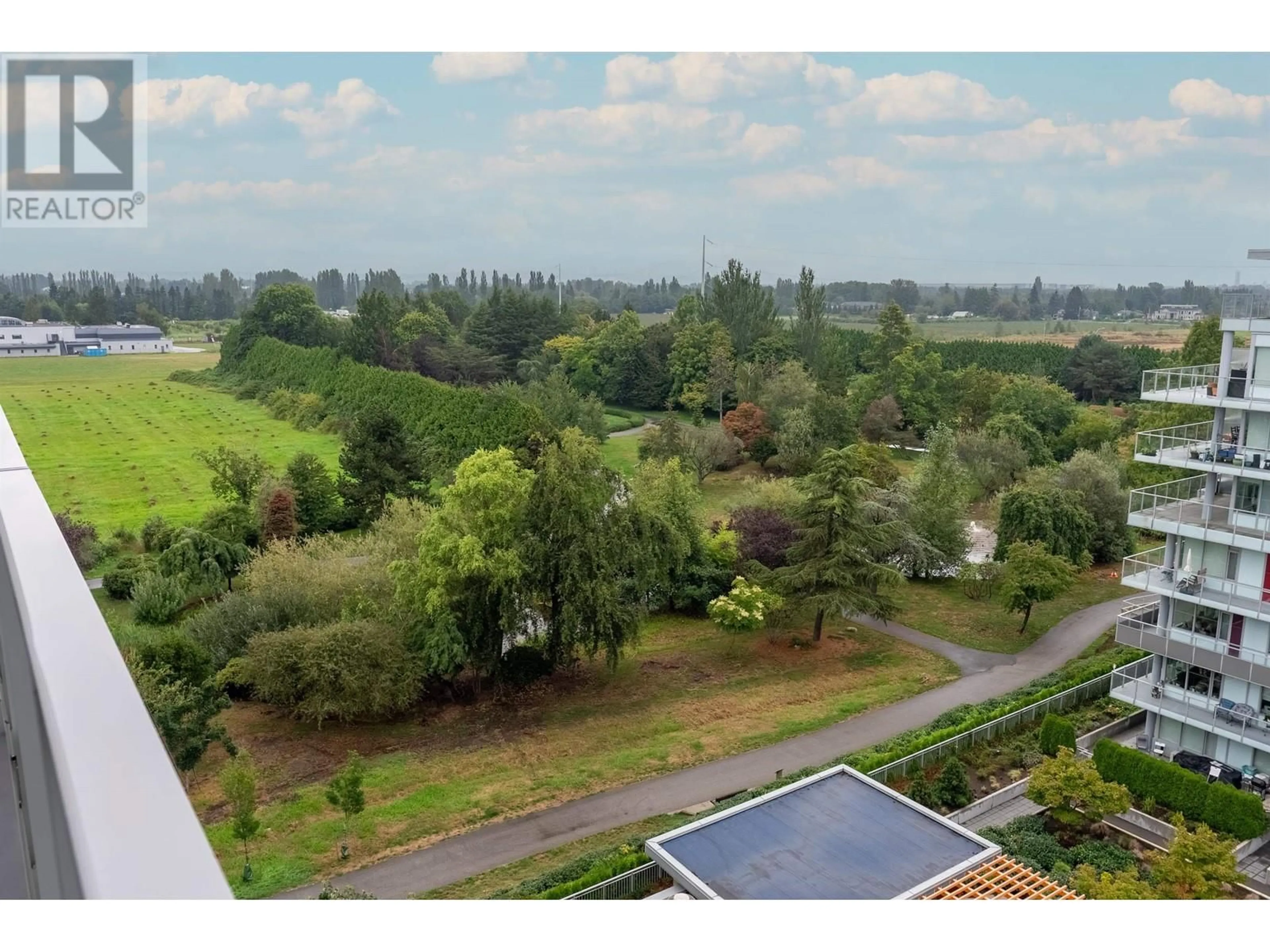 A pic from outside/outdoor area/front of a property/back of a property/a pic from drone, water/lake/river/ocean view for 911 10780 NO. 5 ROAD, Richmond British Columbia V6W0B8