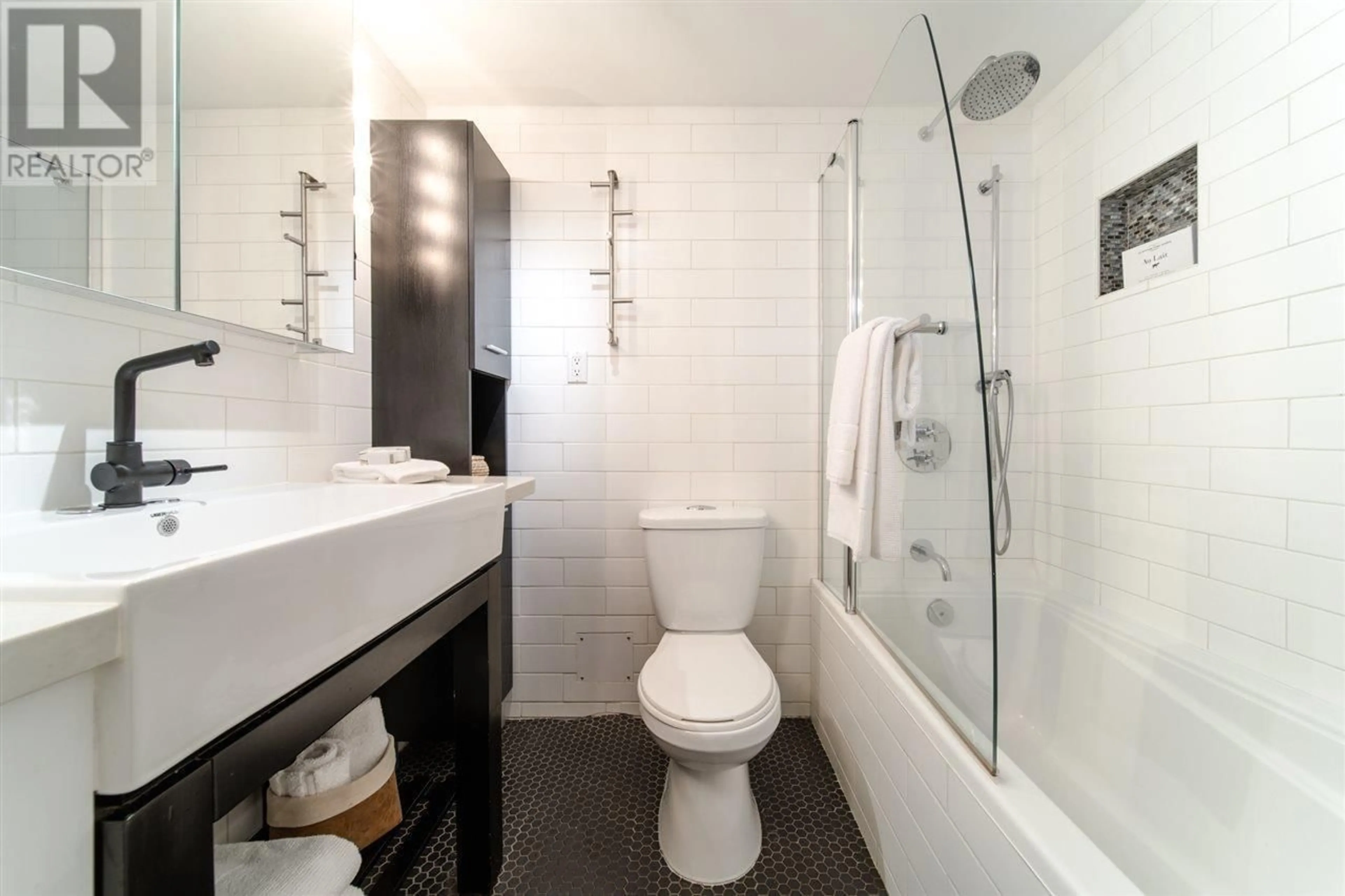 Standard bathroom, ceramic/tile floor for 201 2025 W 2ND AVENUE, Vancouver British Columbia V6J1J6