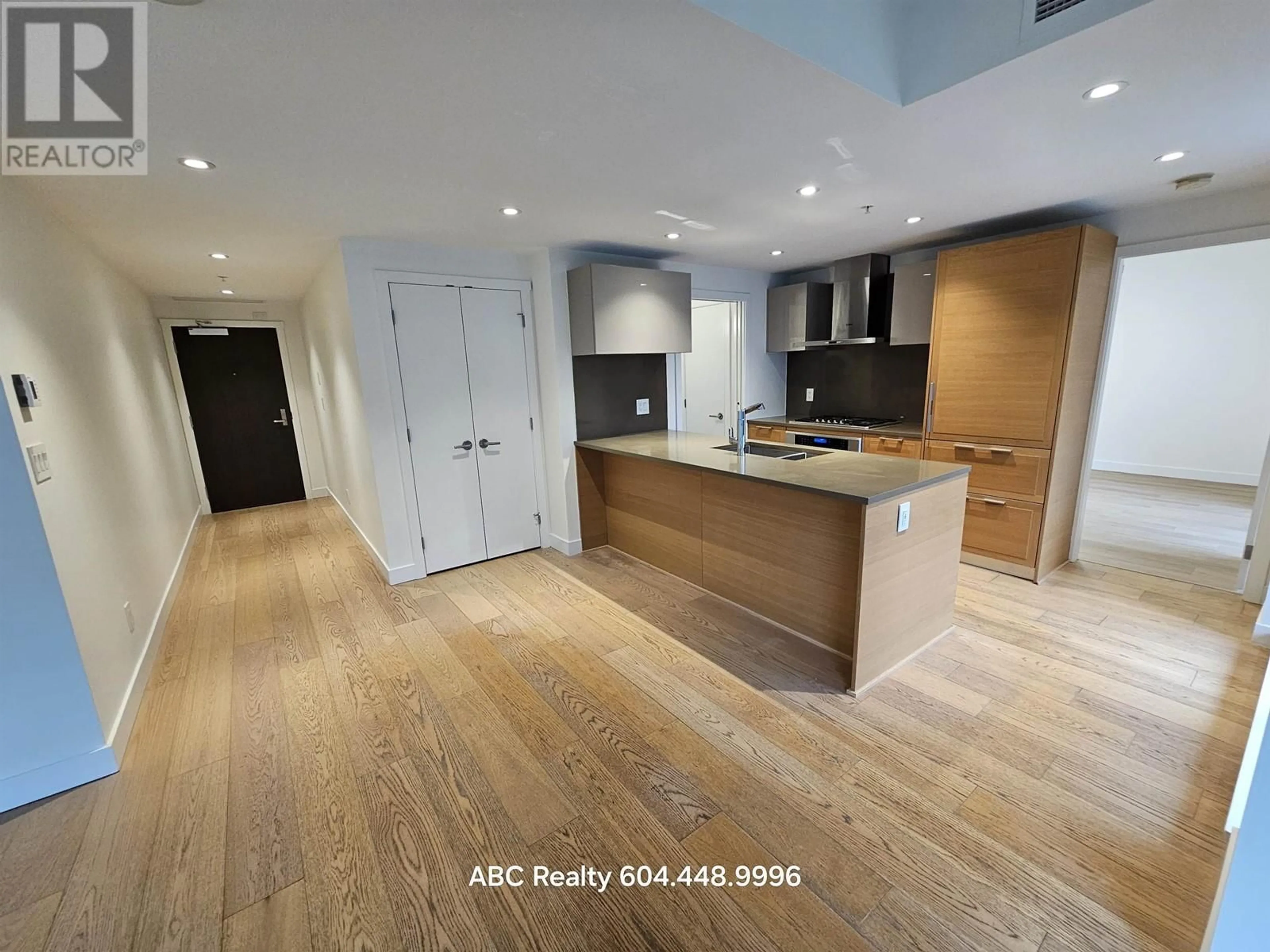 Open concept kitchen, wood/laminate floor for 513 7128 ADERA STREET, Vancouver British Columbia V6P5C4