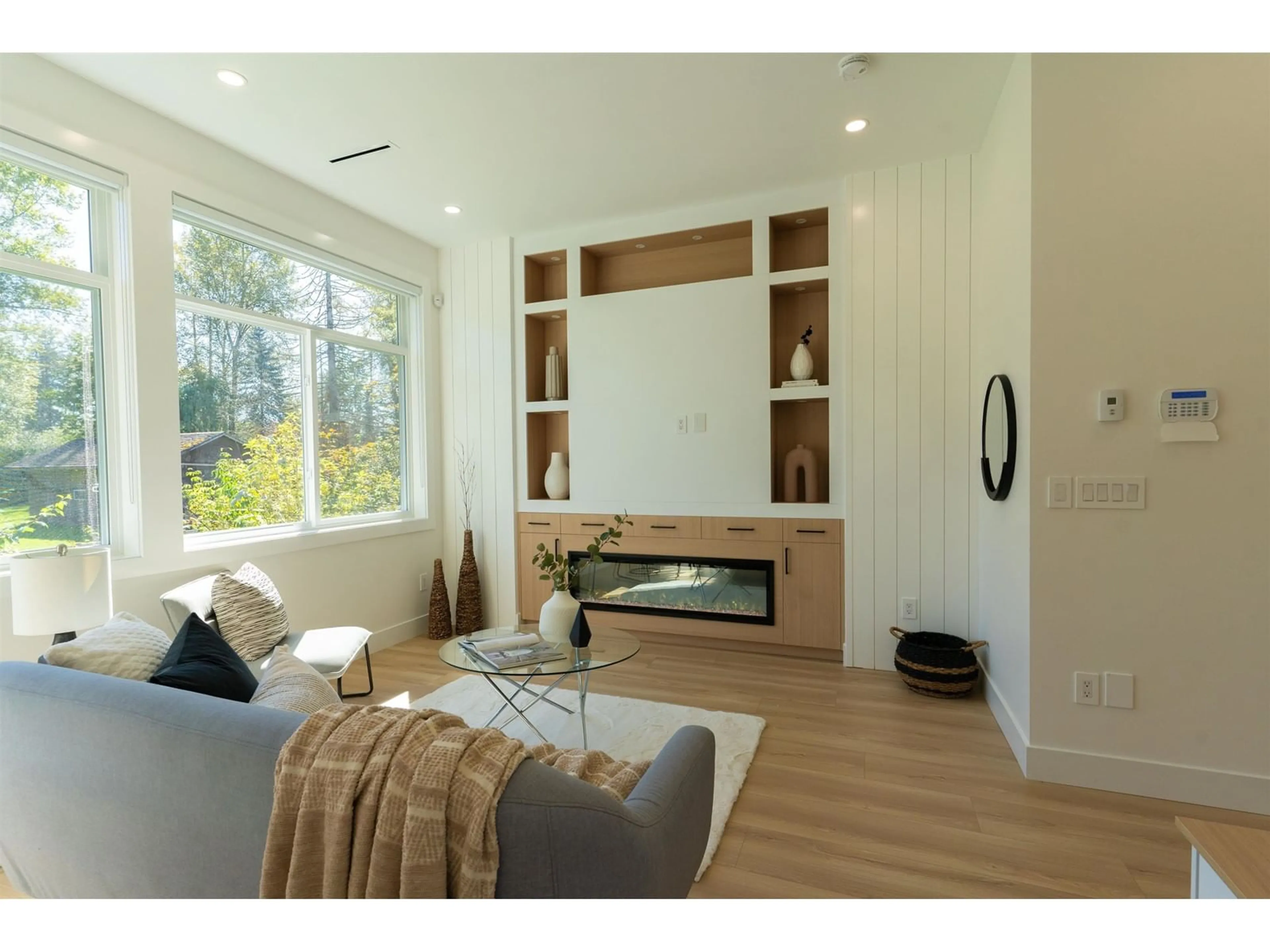 Living room with furniture, wood/laminate floor for 7534 205A, Langley British Columbia V2Y1V5
