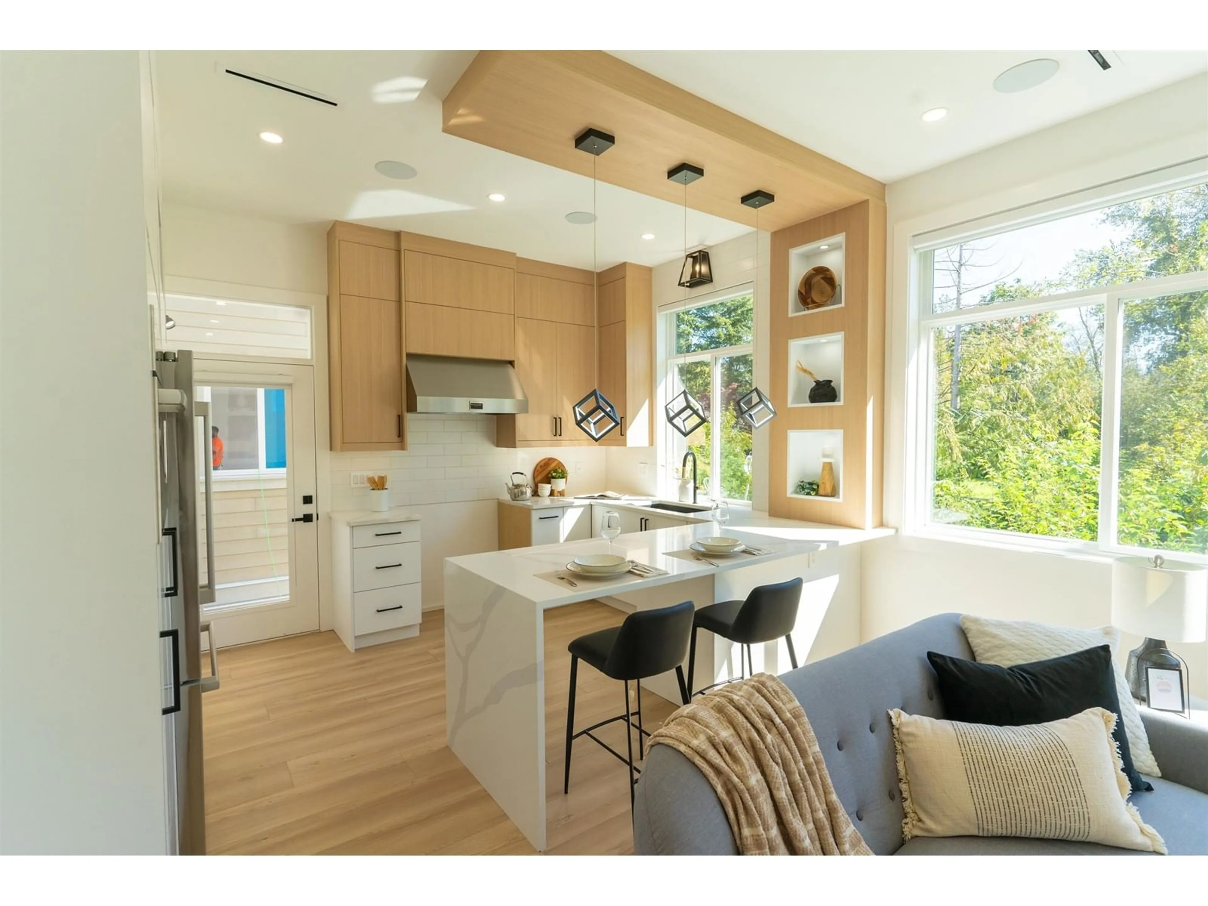 Open concept kitchen, wood/laminate floor for 7534 205A, Langley British Columbia V2Y1V5