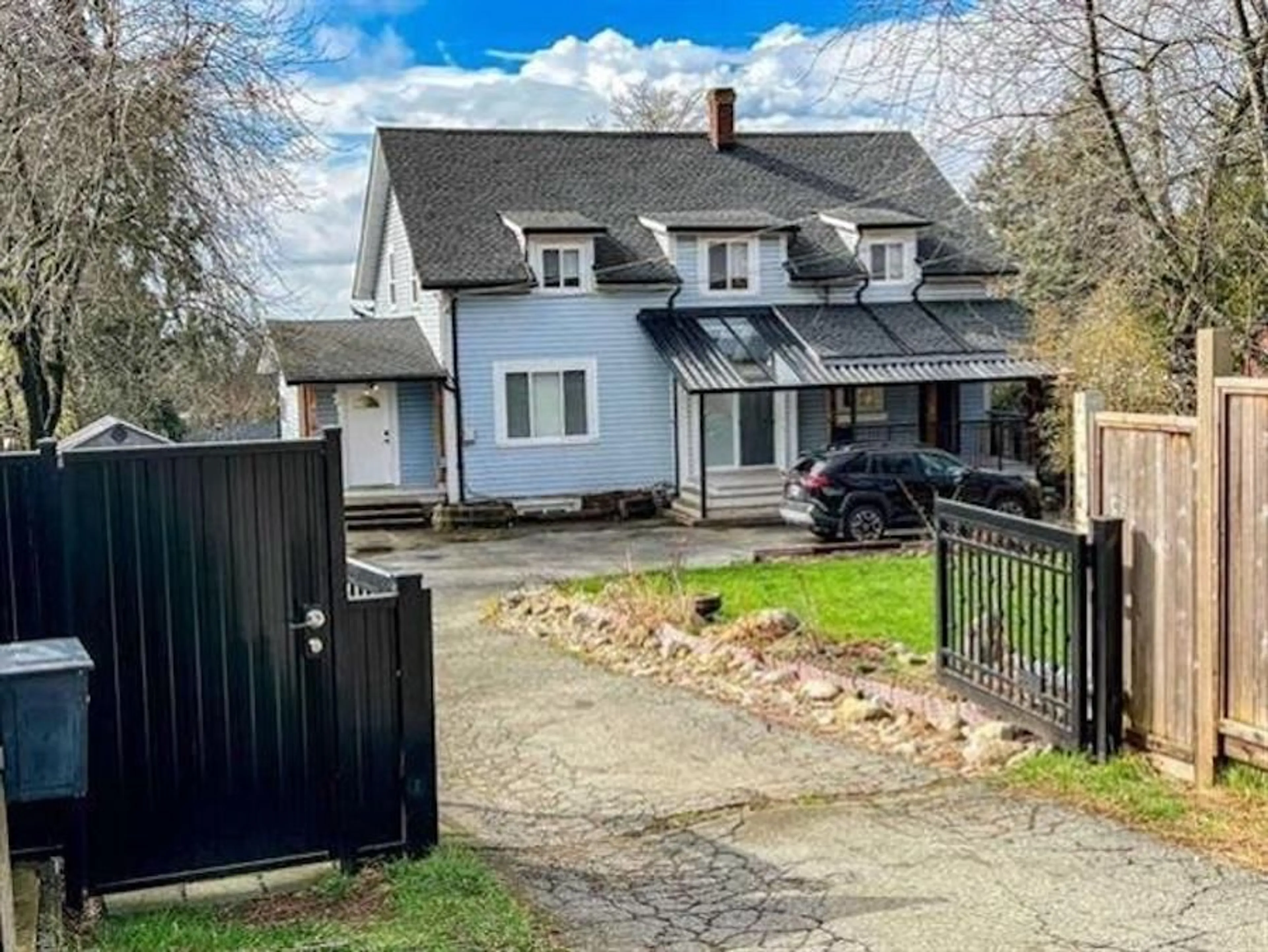 A pic from outside/outdoor area/front of a property/back of a property/a pic from drone, street for 9421 116 STREET, Delta British Columbia V4C5X2