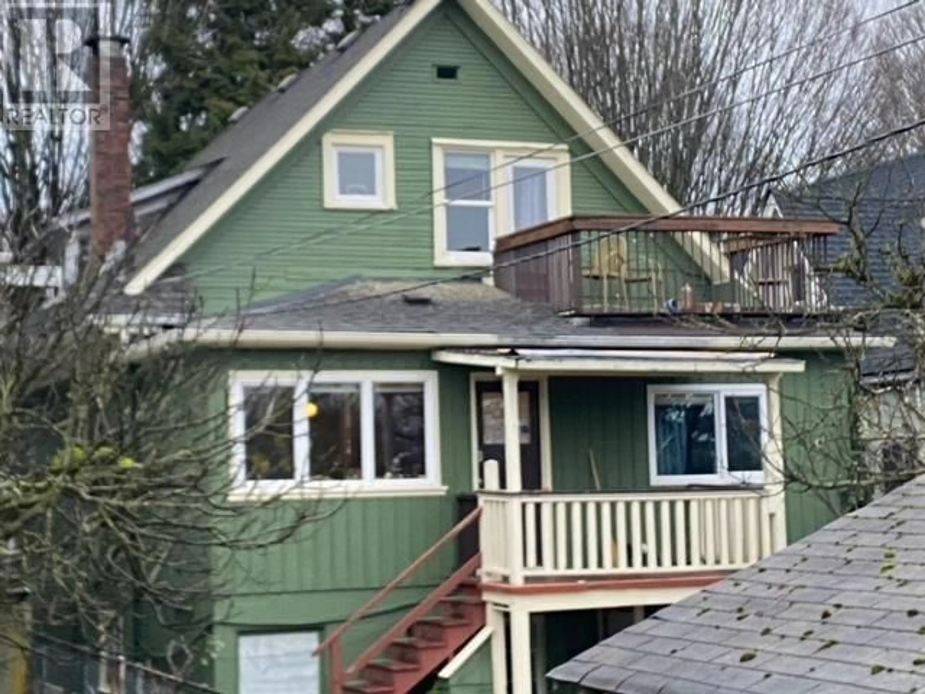 Home with vinyl exterior material, street for 1830 E 1ST AVENUE, Vancouver British Columbia V5N1B1