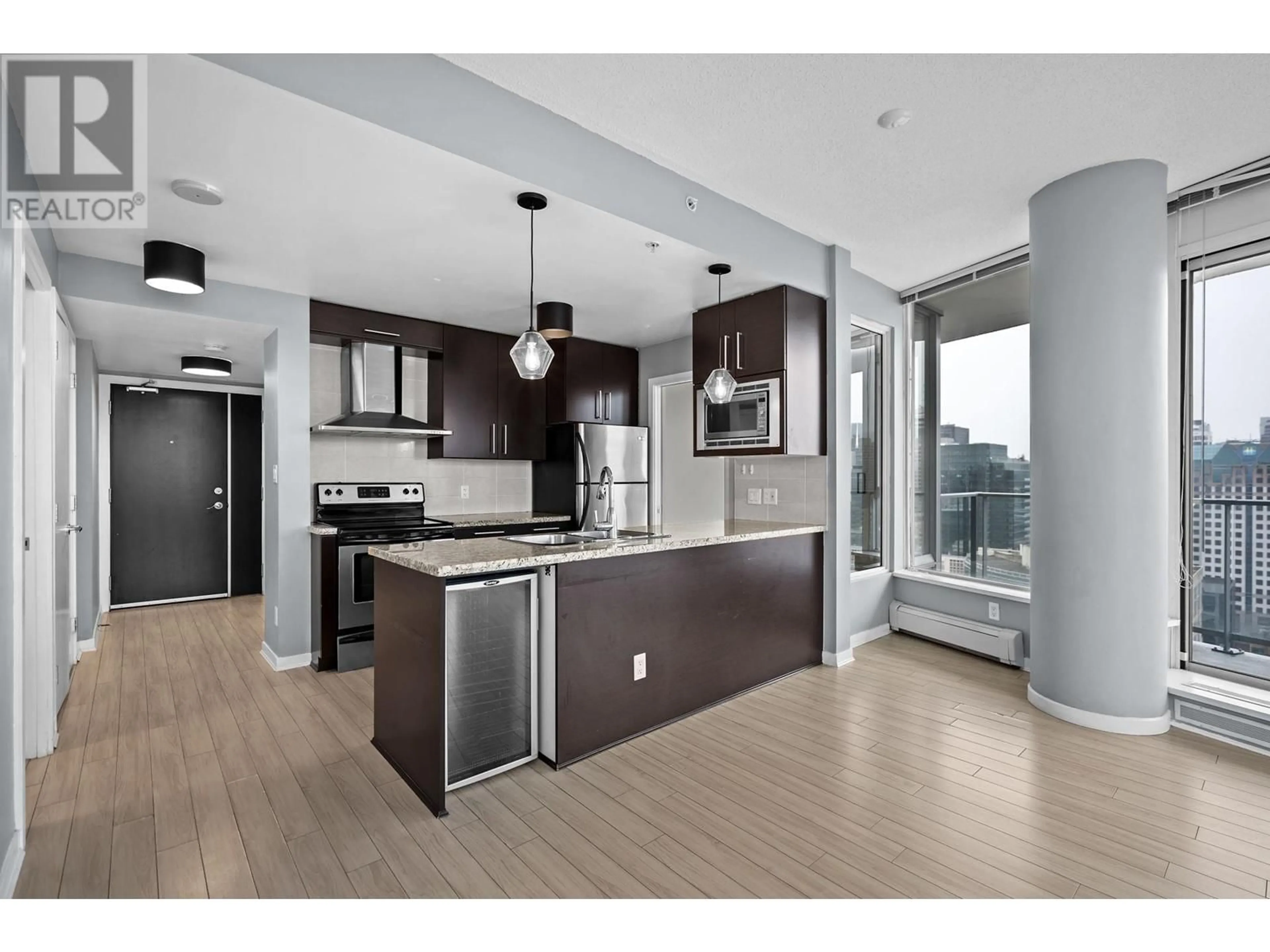 Open concept kitchen, wood/laminate floor for 3803 188 KEEFER PLACE, Vancouver British Columbia V6B0J1