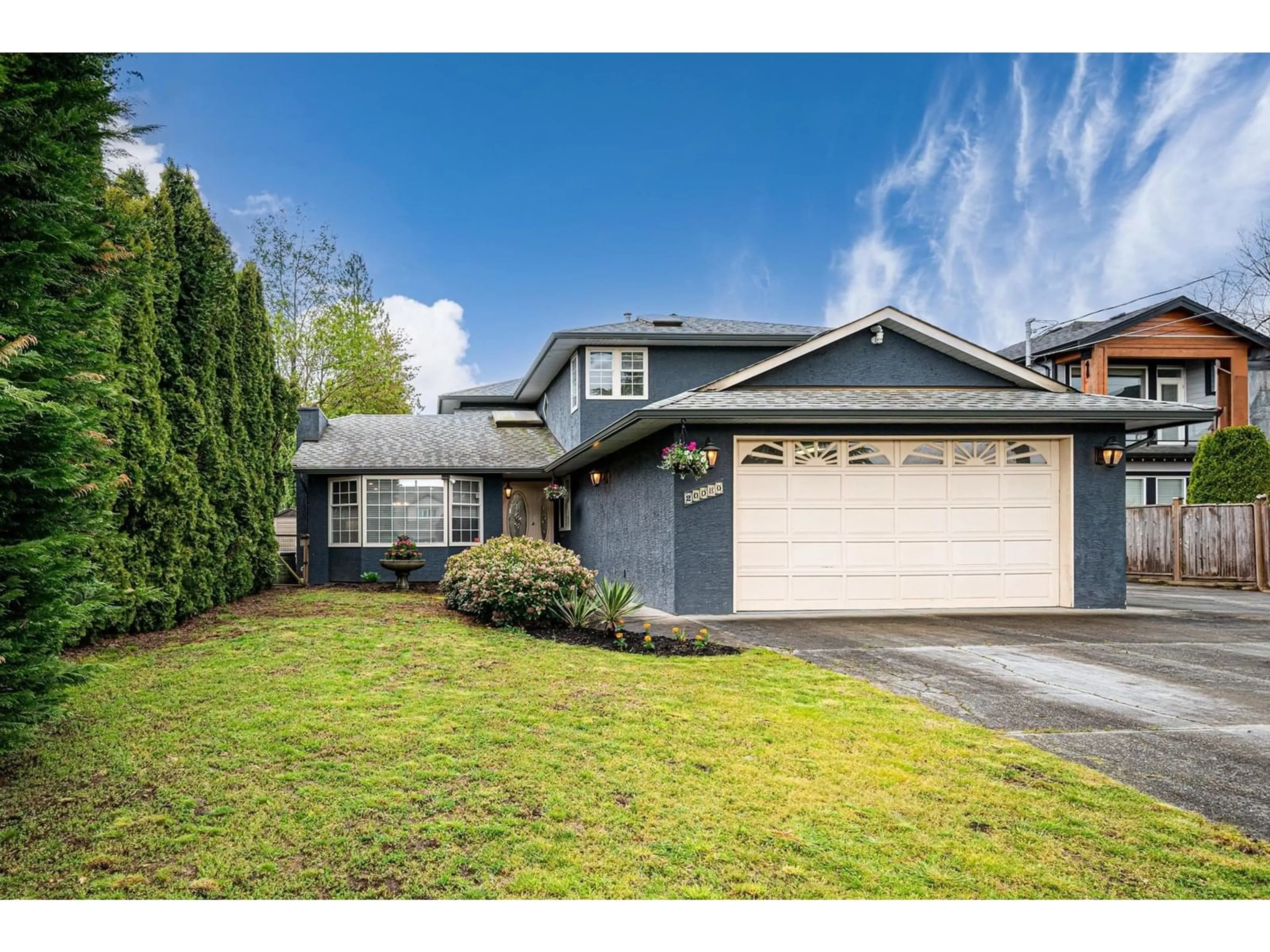 Home with vinyl exterior material, street for 20080 50 AVENUE AVENUE, Langley British Columbia V3A3S7