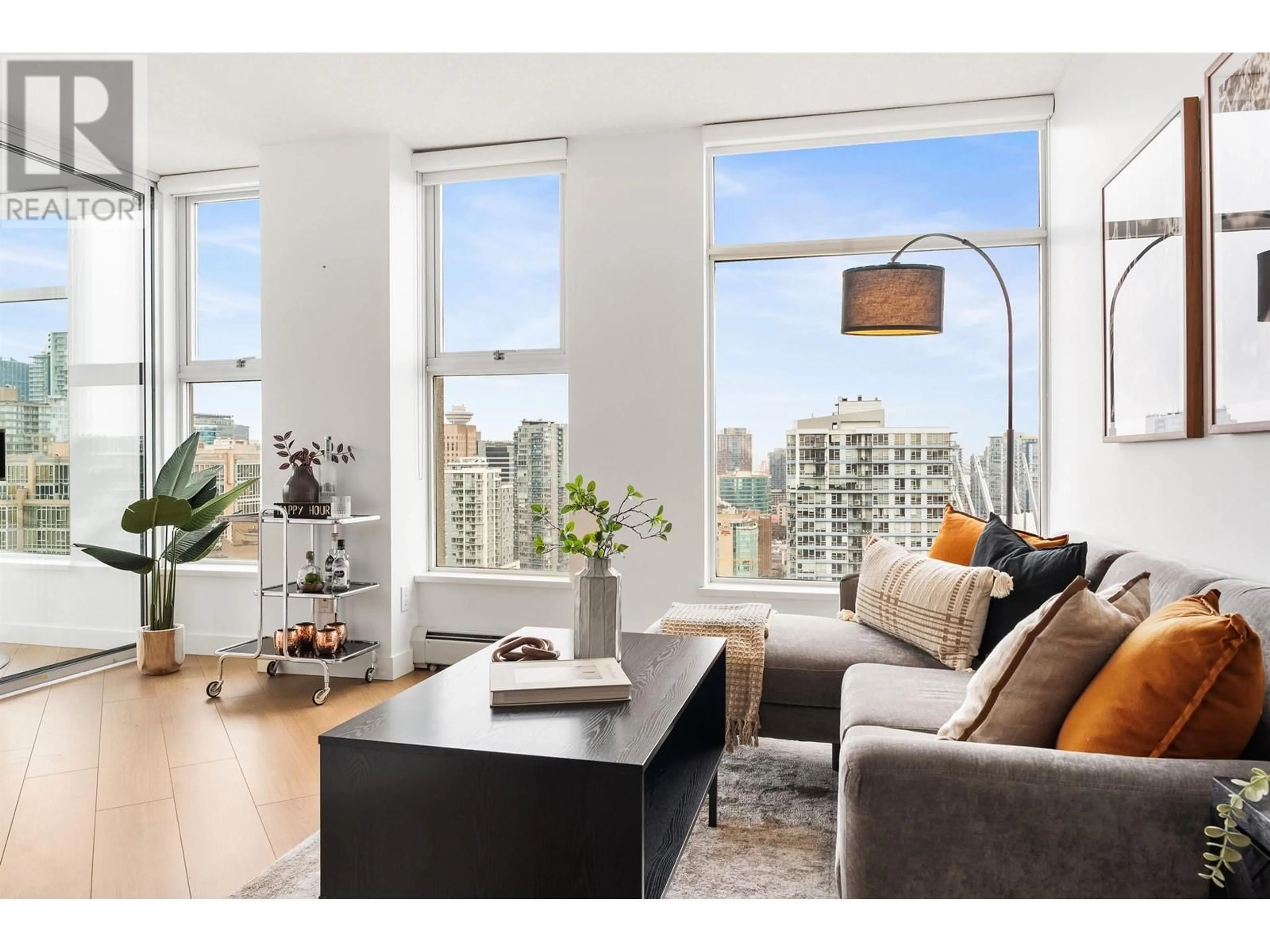 Living room with furniture, wood/laminate floor for 3609 1009 EXPO BOULEVARD, Vancouver British Columbia V6Z2V9