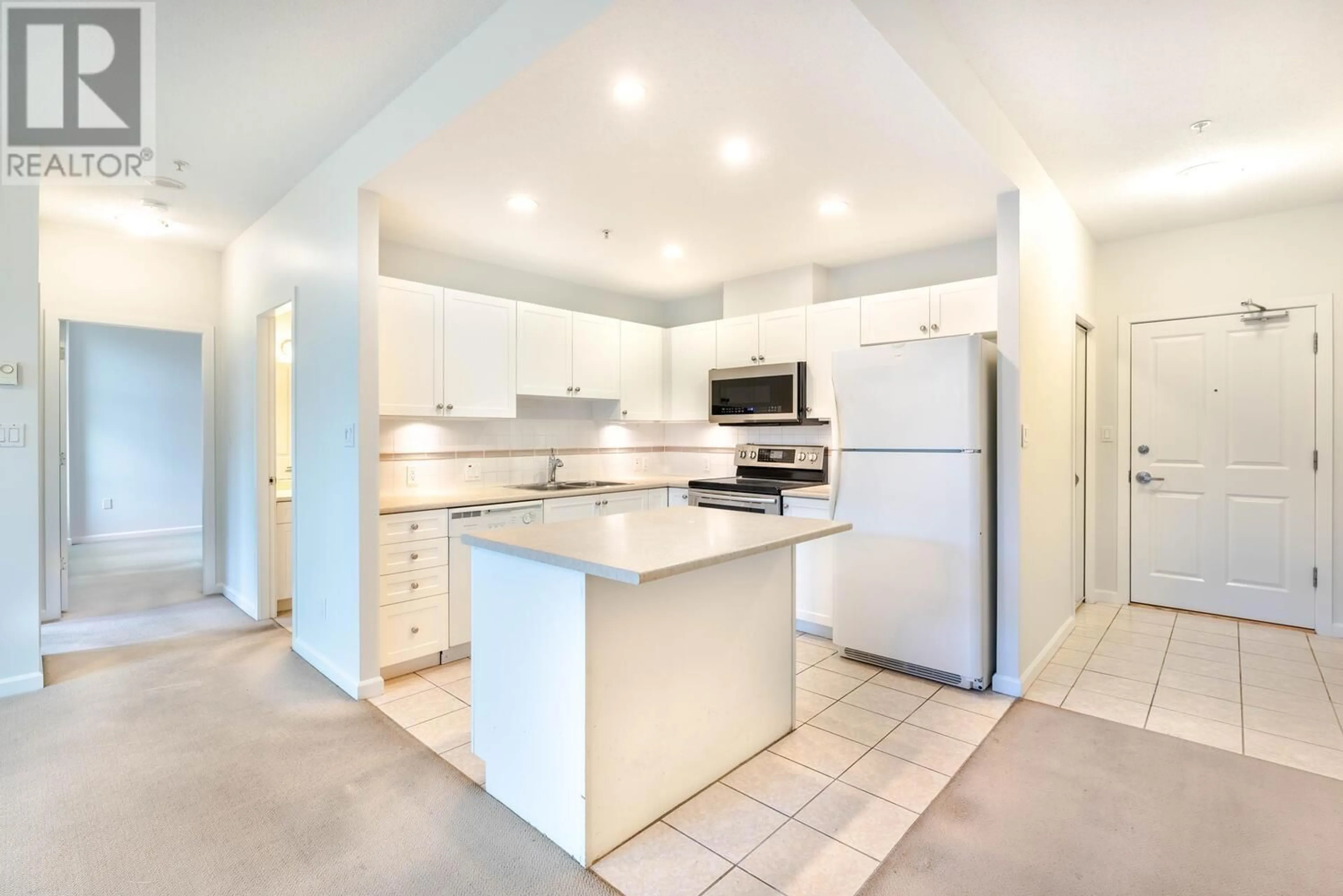 Open concept kitchen, ceramic/tile floor for 101 615 HAMILTON STREET, New Westminster British Columbia V3M7A7