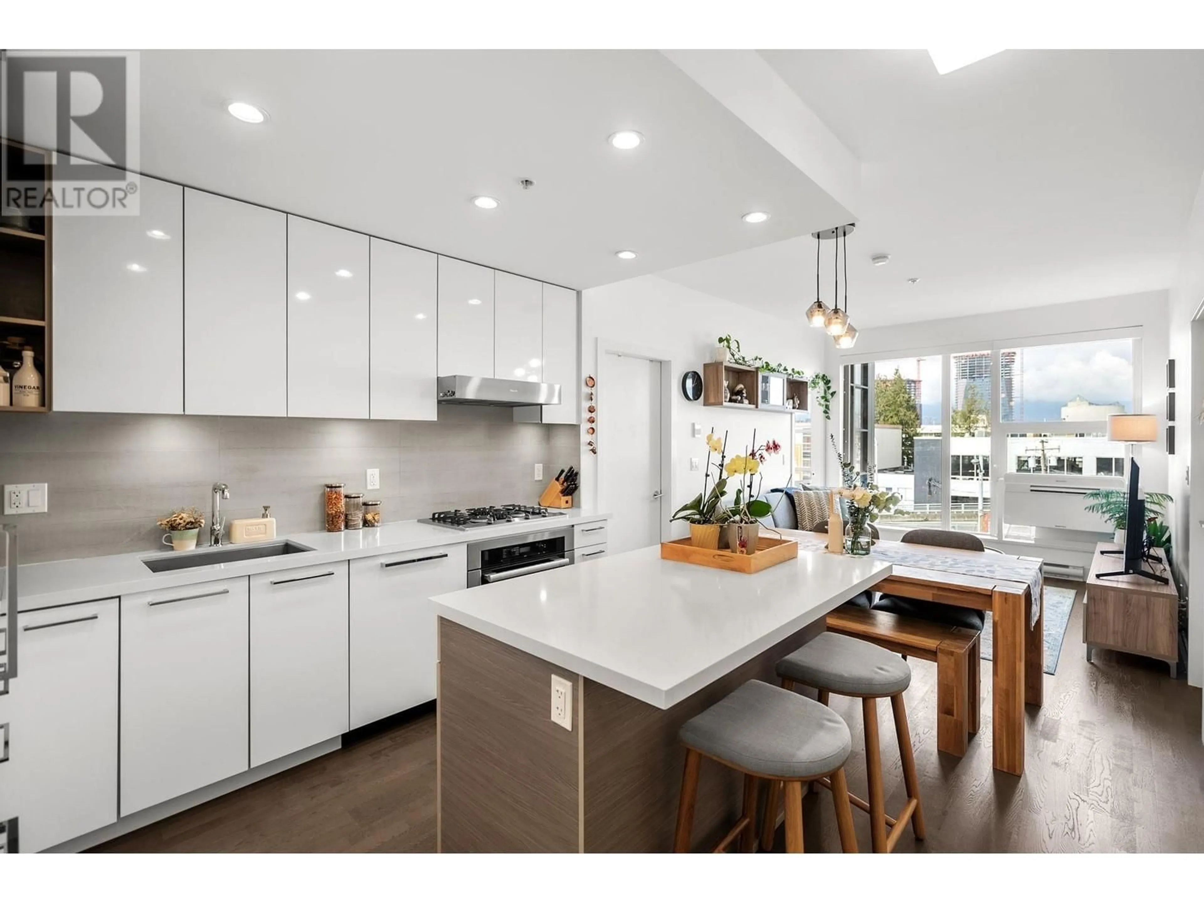 Open concept kitchen, ceramic/tile floor for 315 1628 W 4TH AVENUE, Vancouver British Columbia V6J0G6