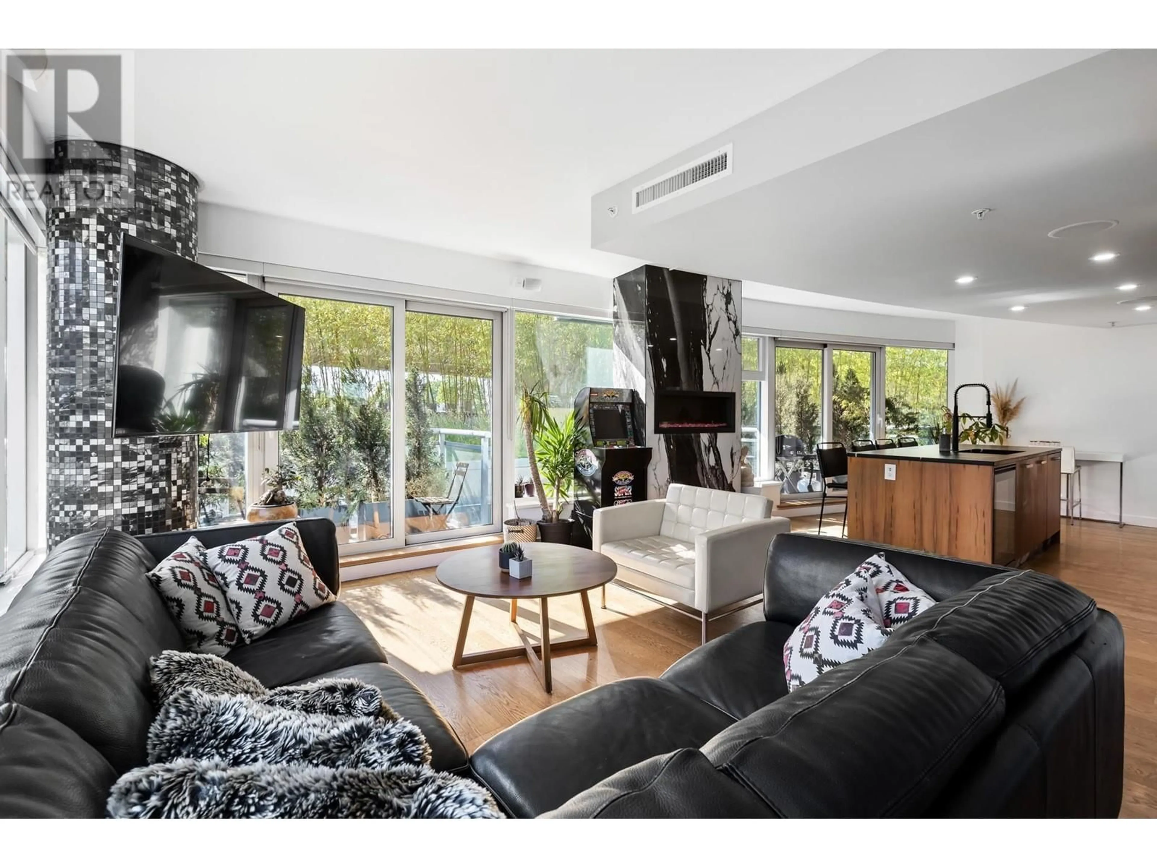 Living room with furniture, unknown for 201 - 1565 6TH AVENUE, Vancouver British Columbia V6J1R1