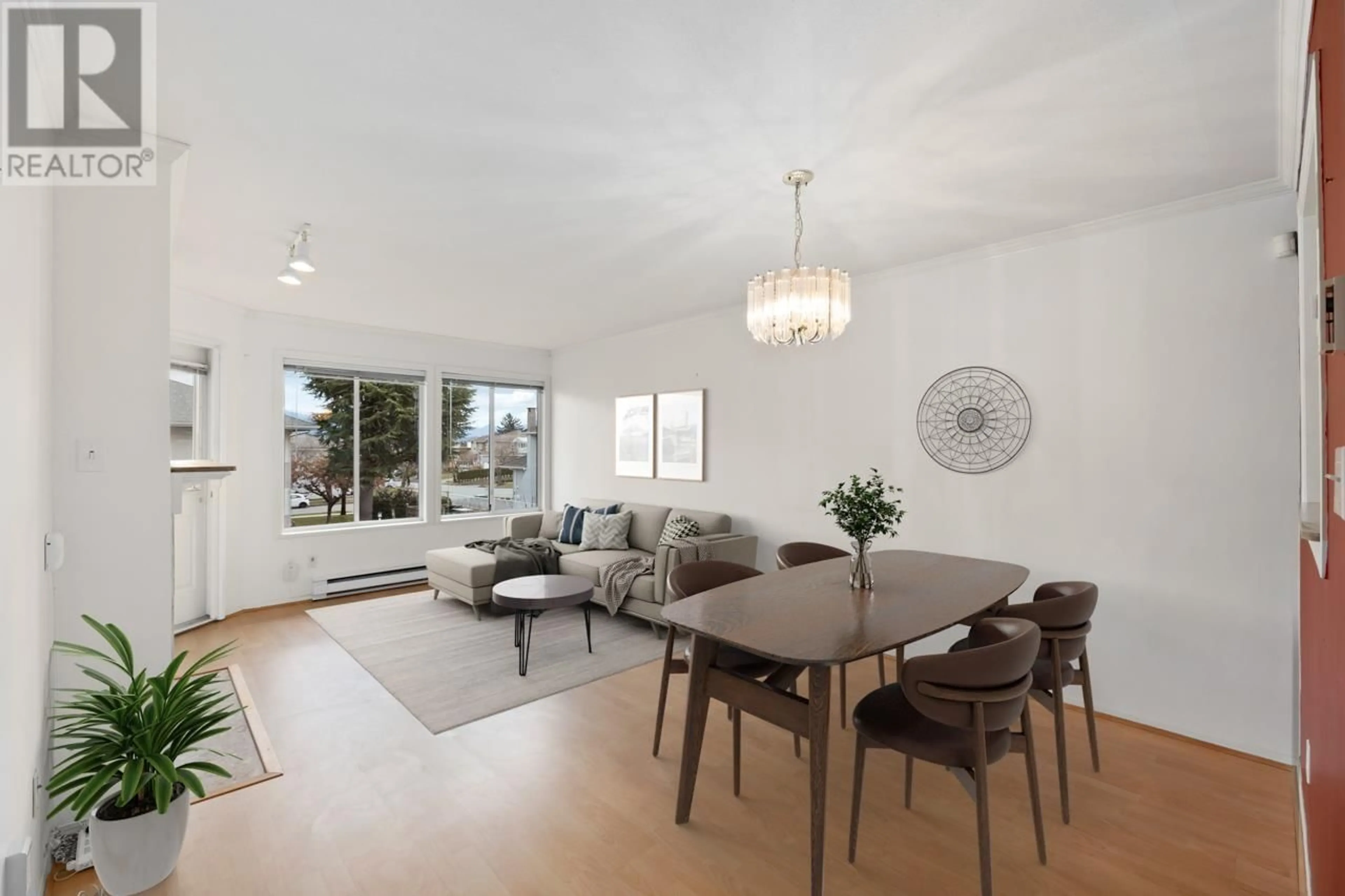 Living room with furniture, wood/laminate floor for 206 - 5875 IMPERIAL STREET, Burnaby British Columbia V5J1G4