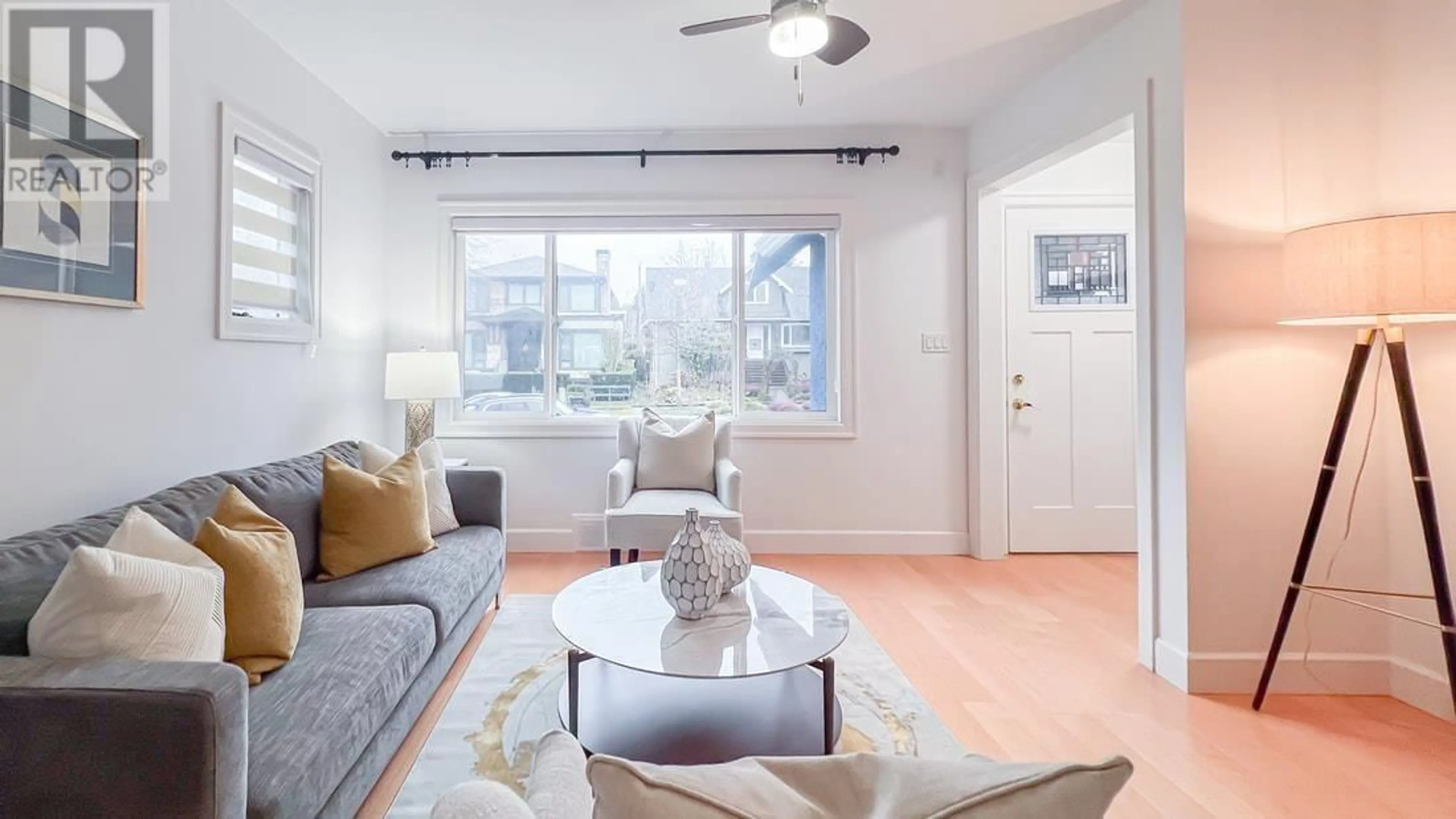 Living room with furniture, wood/laminate floor for 4633 W 11TH AVENUE, Vancouver British Columbia V6R2M6