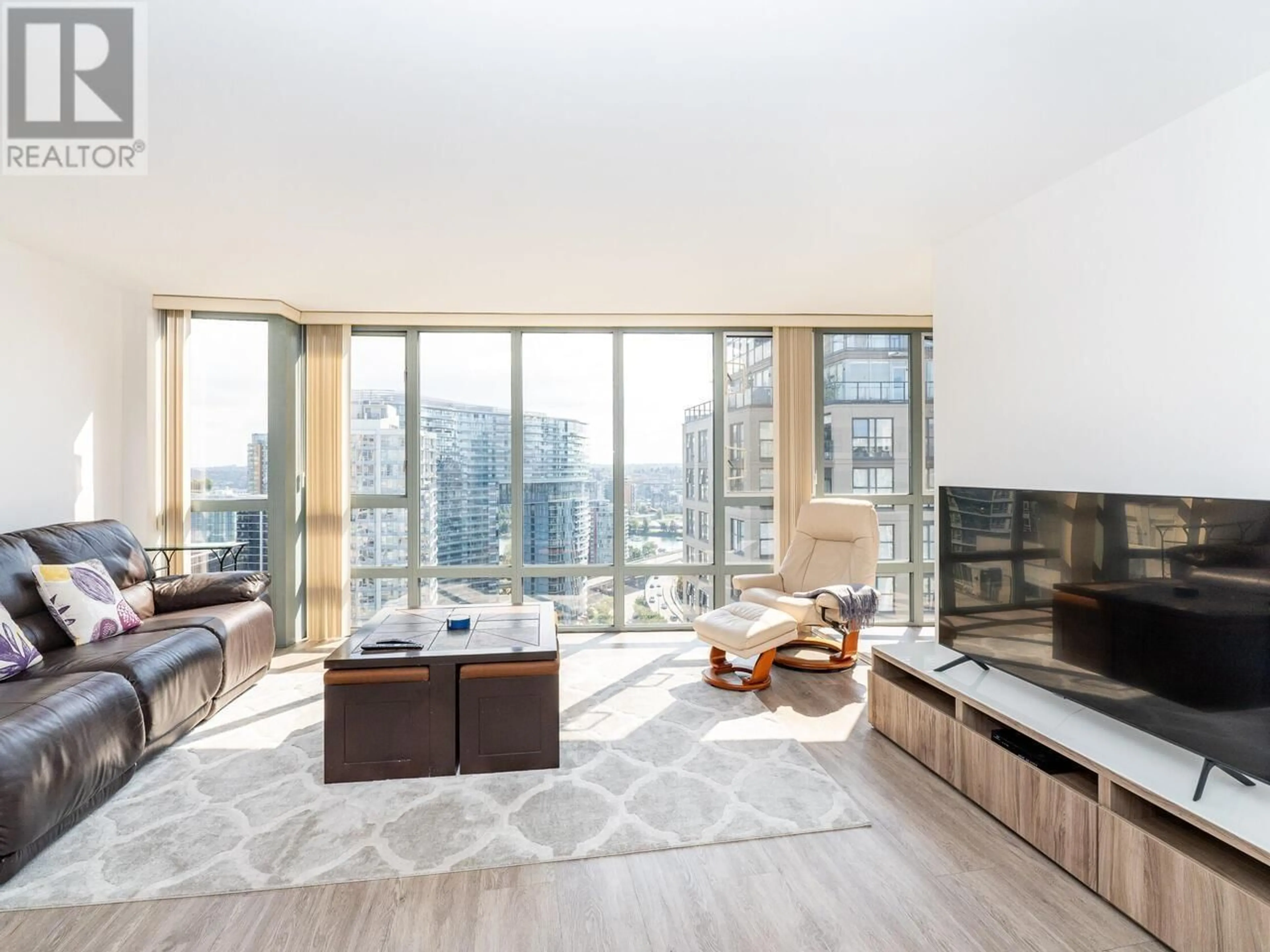 Living room with furniture, wood/laminate floor for 2302 - 950 CAMBIE STREET, Vancouver British Columbia V6B5X5