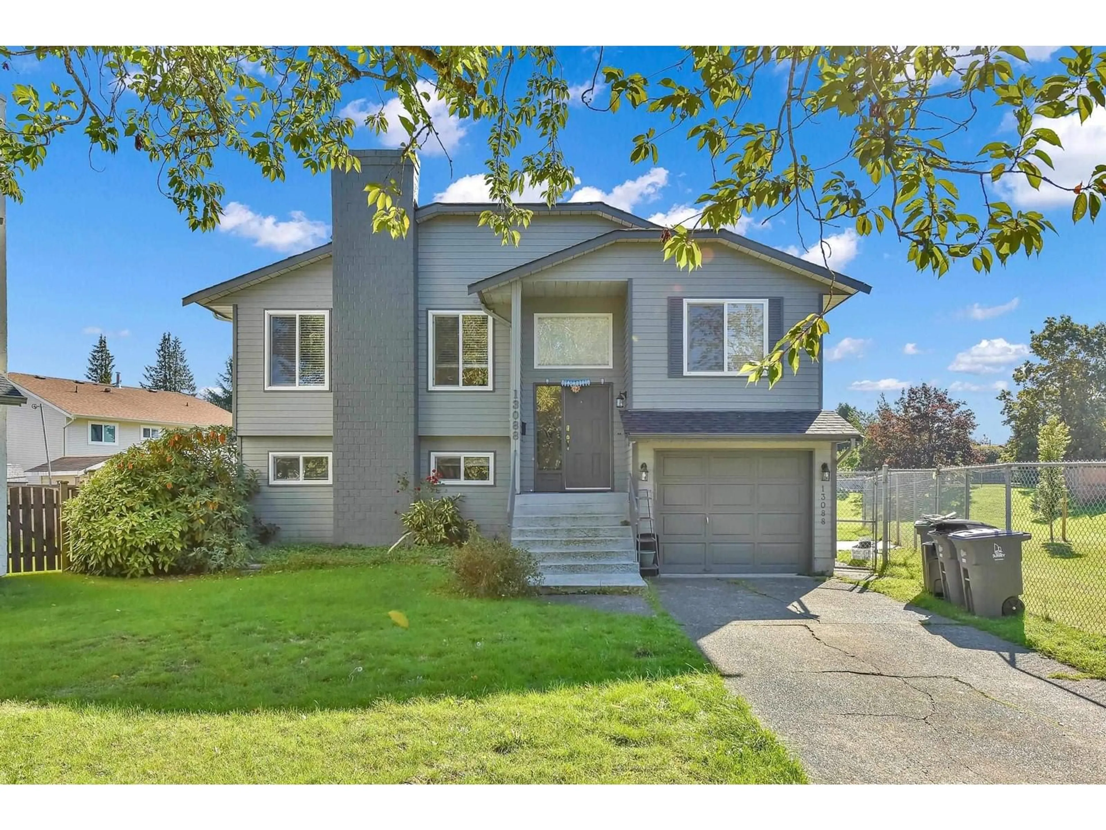 Home with vinyl exterior material, street for 13088 65A, Surrey British Columbia V3W8P7