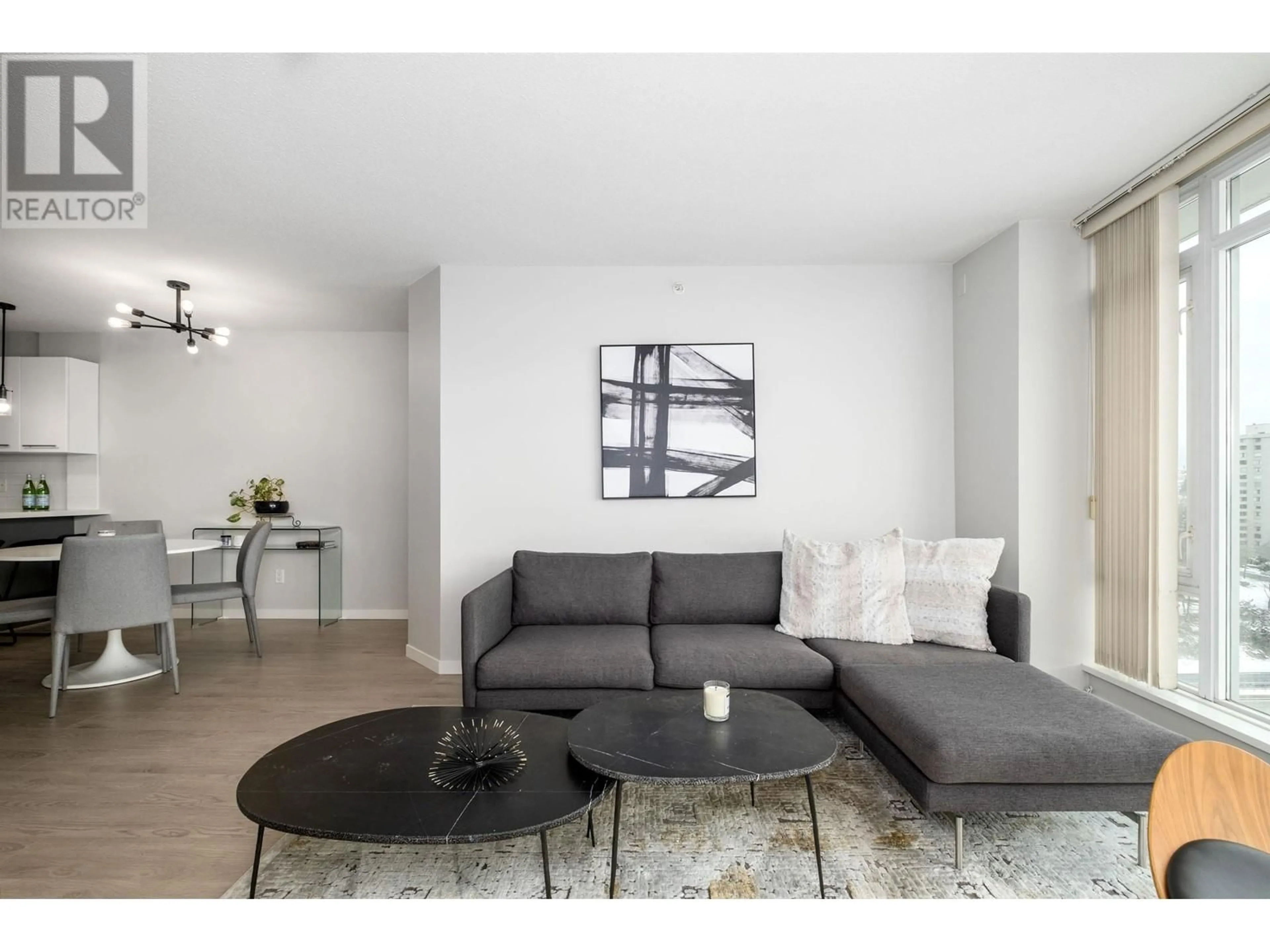 Living room with furniture, wood/laminate floor for 1906 2133 DOUGLAS ROAD, Burnaby British Columbia V5C0E9