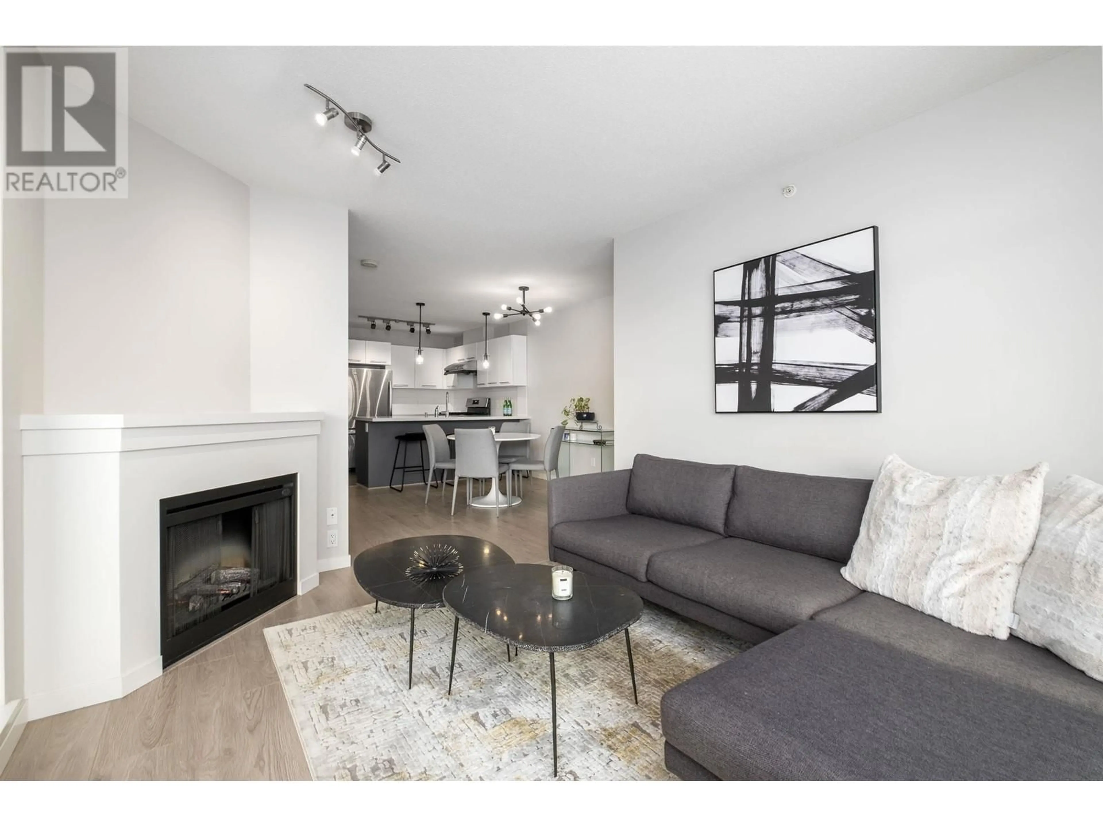 Living room with furniture, wood/laminate floor for 1906 2133 DOUGLAS ROAD, Burnaby British Columbia V5C0E9