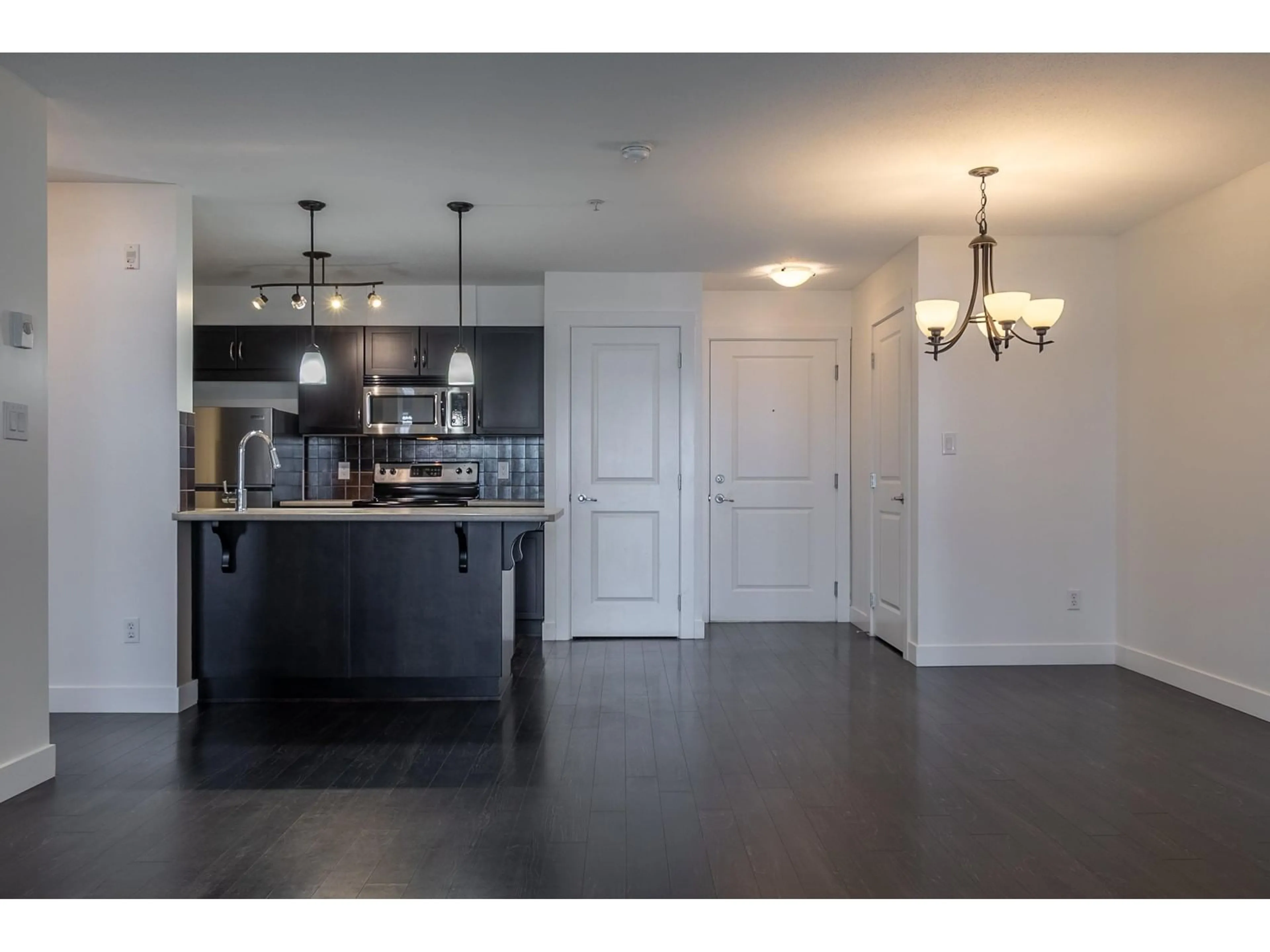 Open concept kitchen, unknown for 204 - 2038 SANDALWOOD, Abbotsford British Columbia V2S3H6