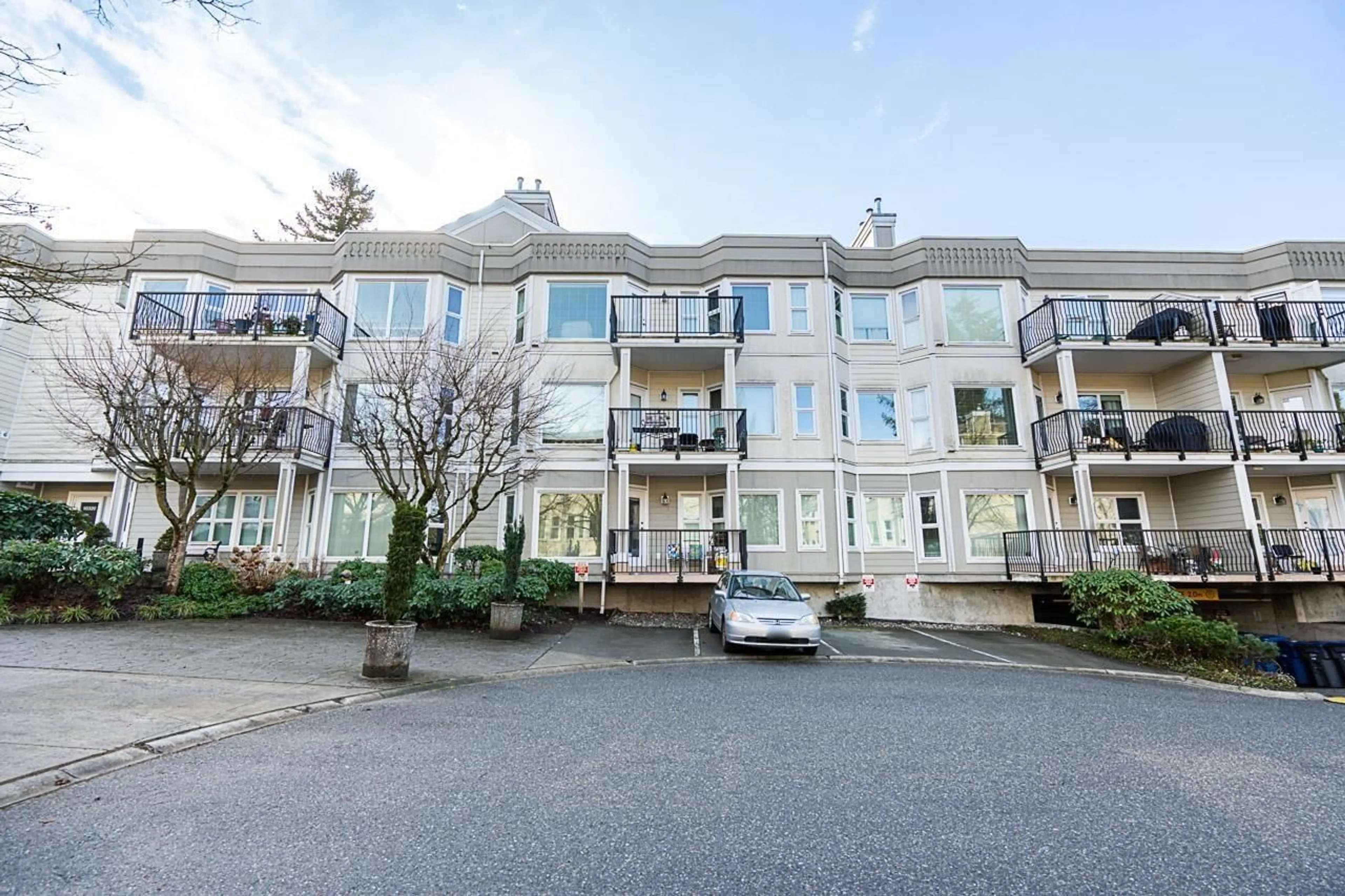 A pic from outside/outdoor area/front of a property/back of a property/a pic from drone, unknown for 312 - 10320 156, Surrey British Columbia V3R4L8