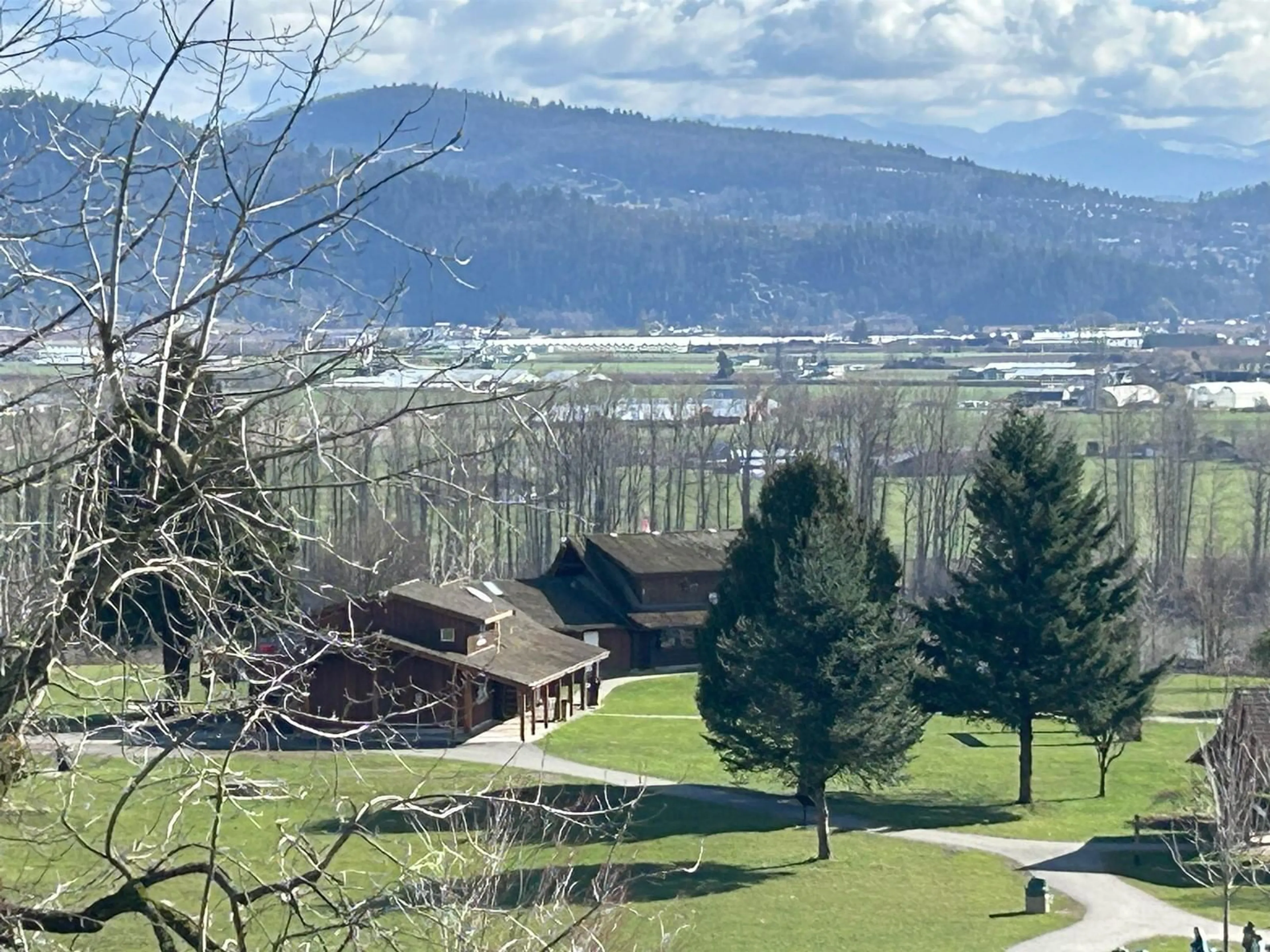 A pic from outside/outdoor area/front of a property/back of a property/a pic from drone, mountain view for A314 - 33755 7TH, Mission British Columbia V2V0A4