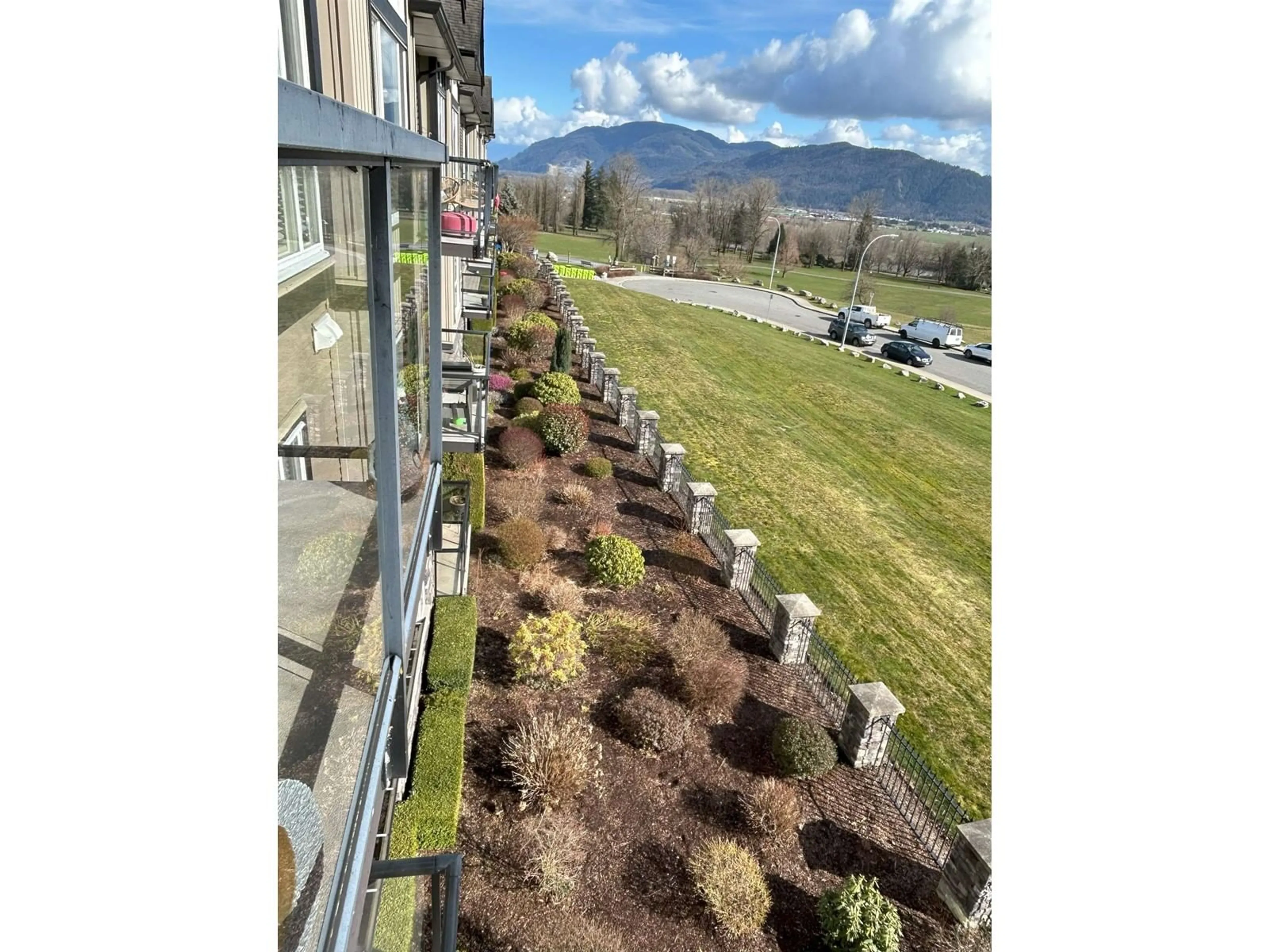 A pic from outside/outdoor area/front of a property/back of a property/a pic from drone, mountain view for A314 - 33755 7TH, Mission British Columbia V2V0A4