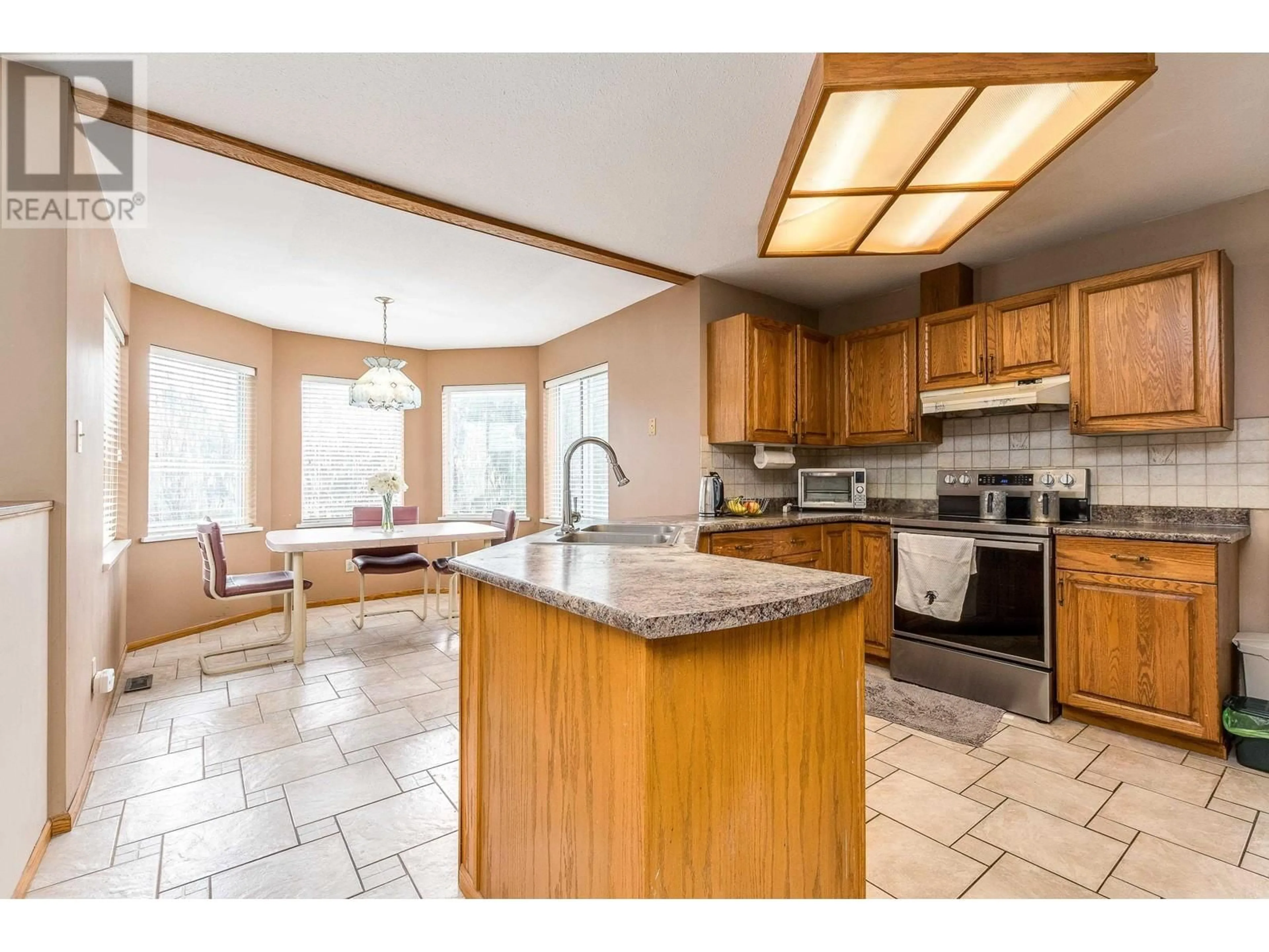Open concept kitchen, ceramic/tile floor for 133 WARRICK STREET, Coquitlam British Columbia V3K5L3
